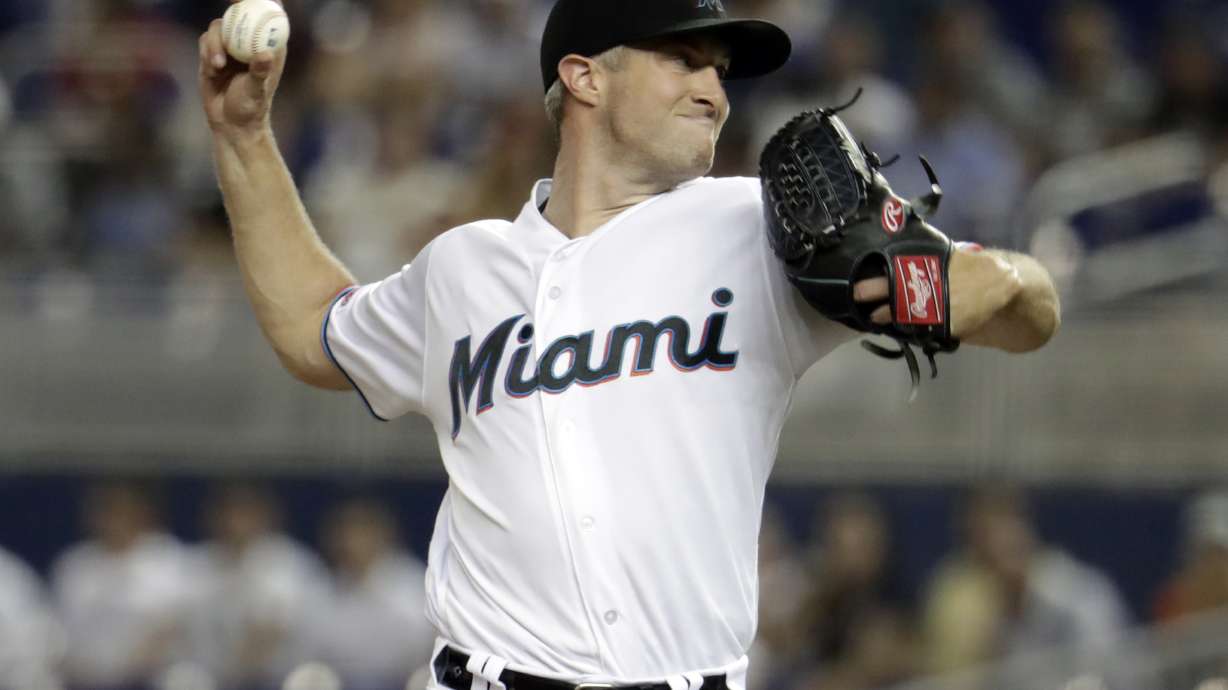 Marlins send Giants to 6th consecutive loss, 11-3