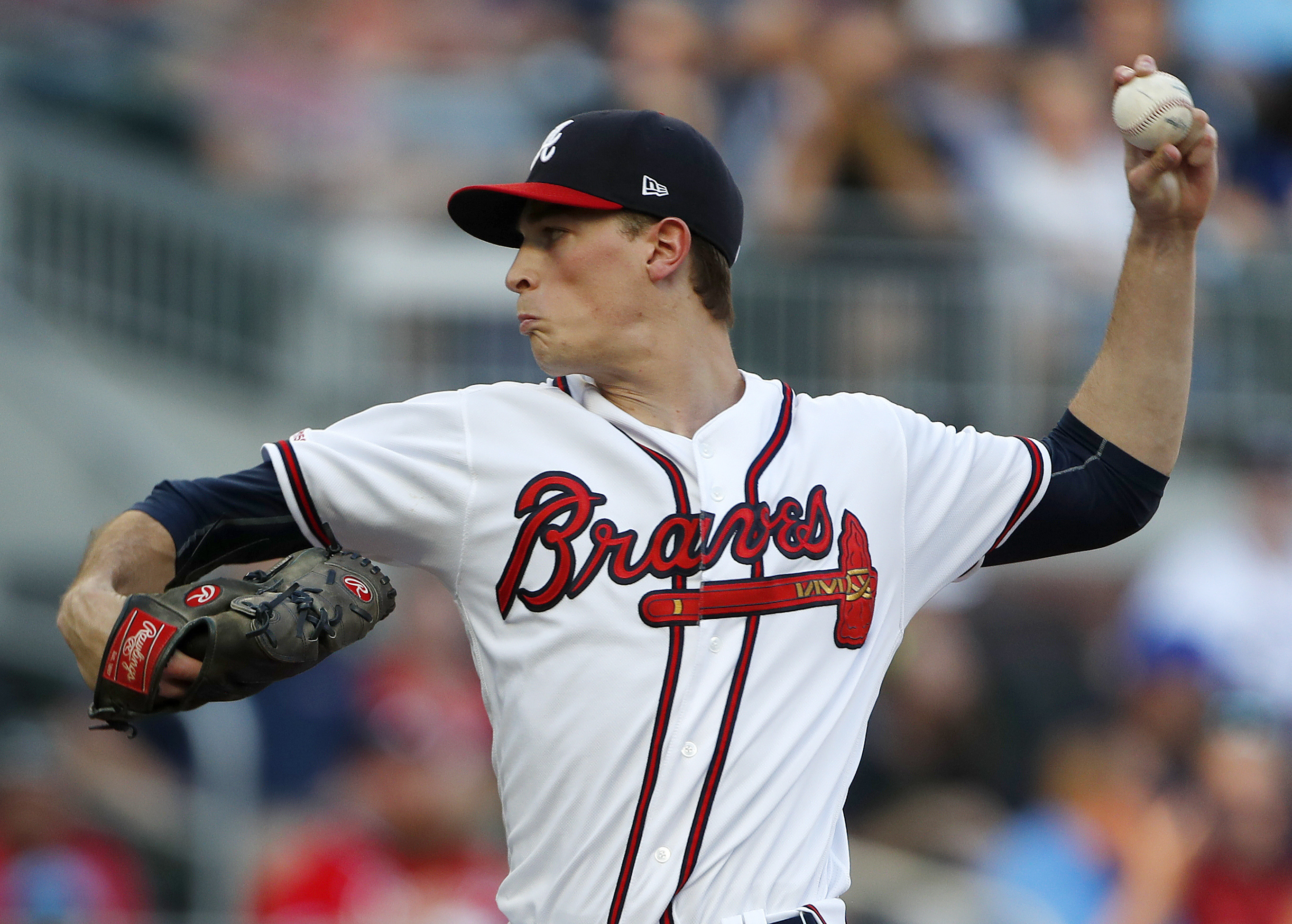 Strasburg strikes out 11, Nationals hold off Braves 5-4
