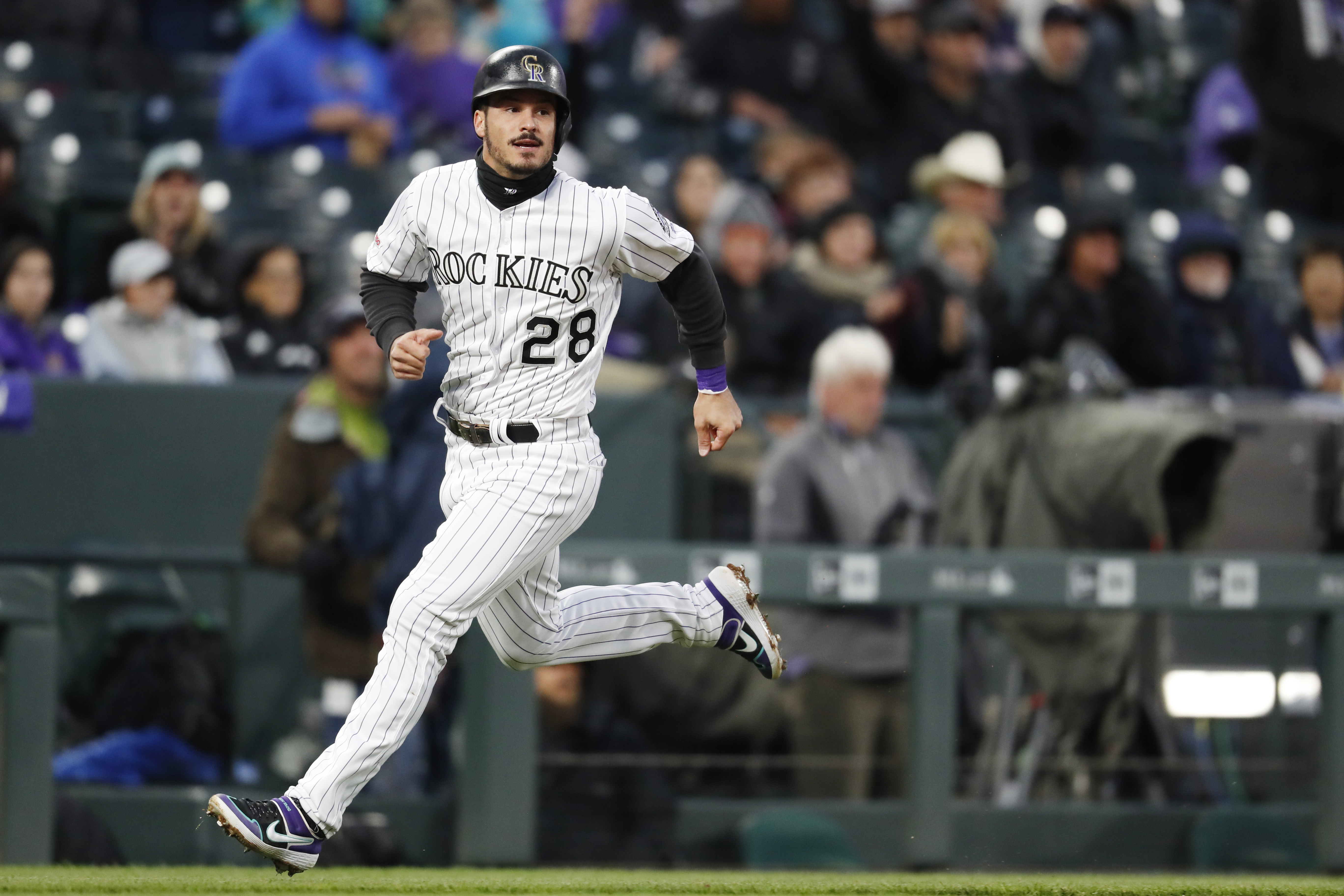 Iannetta homers in 7th, Rox beat D'backs 6-2 on rainy night
