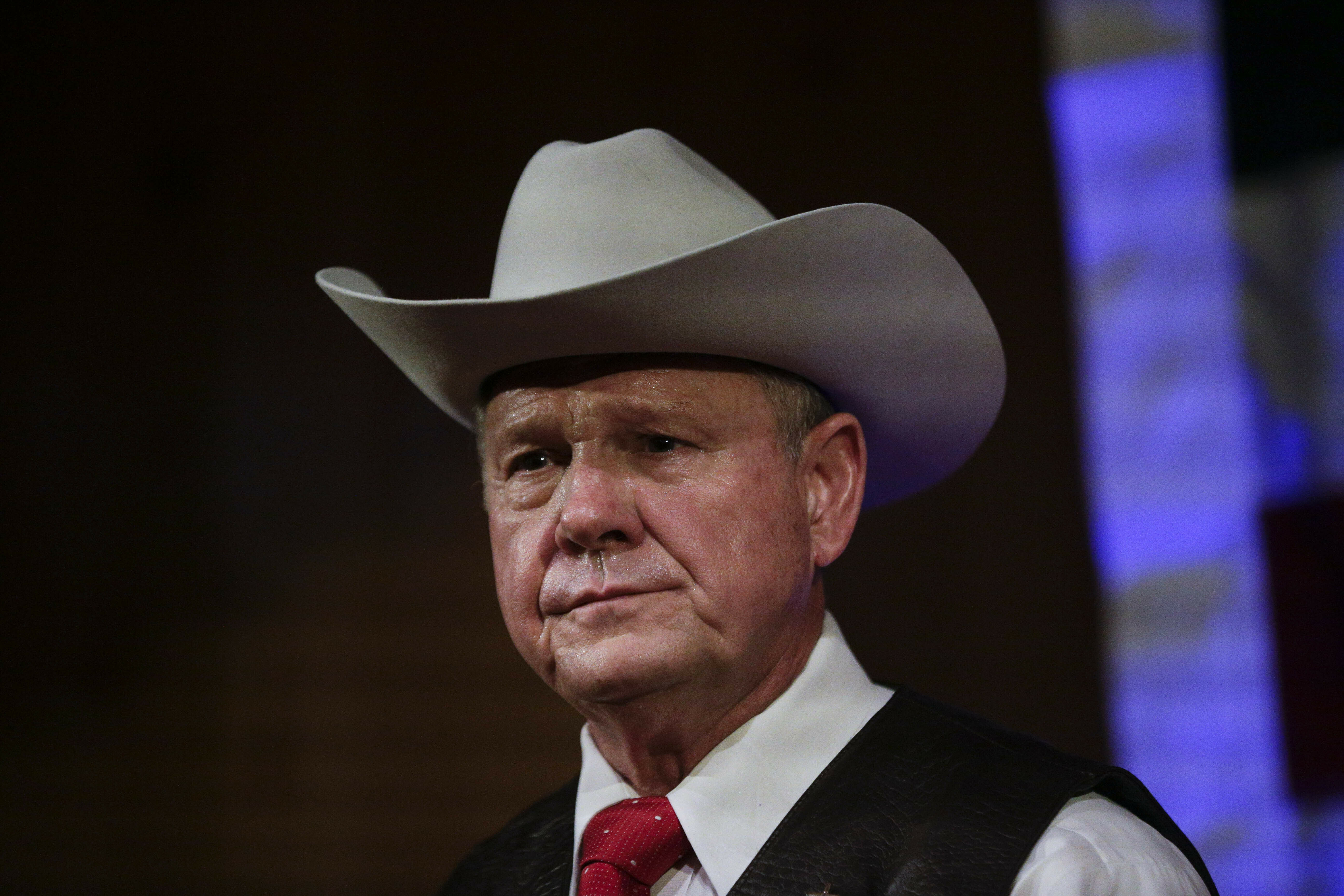 Trump urges Roy Moore not to run for US Senate in Alabama