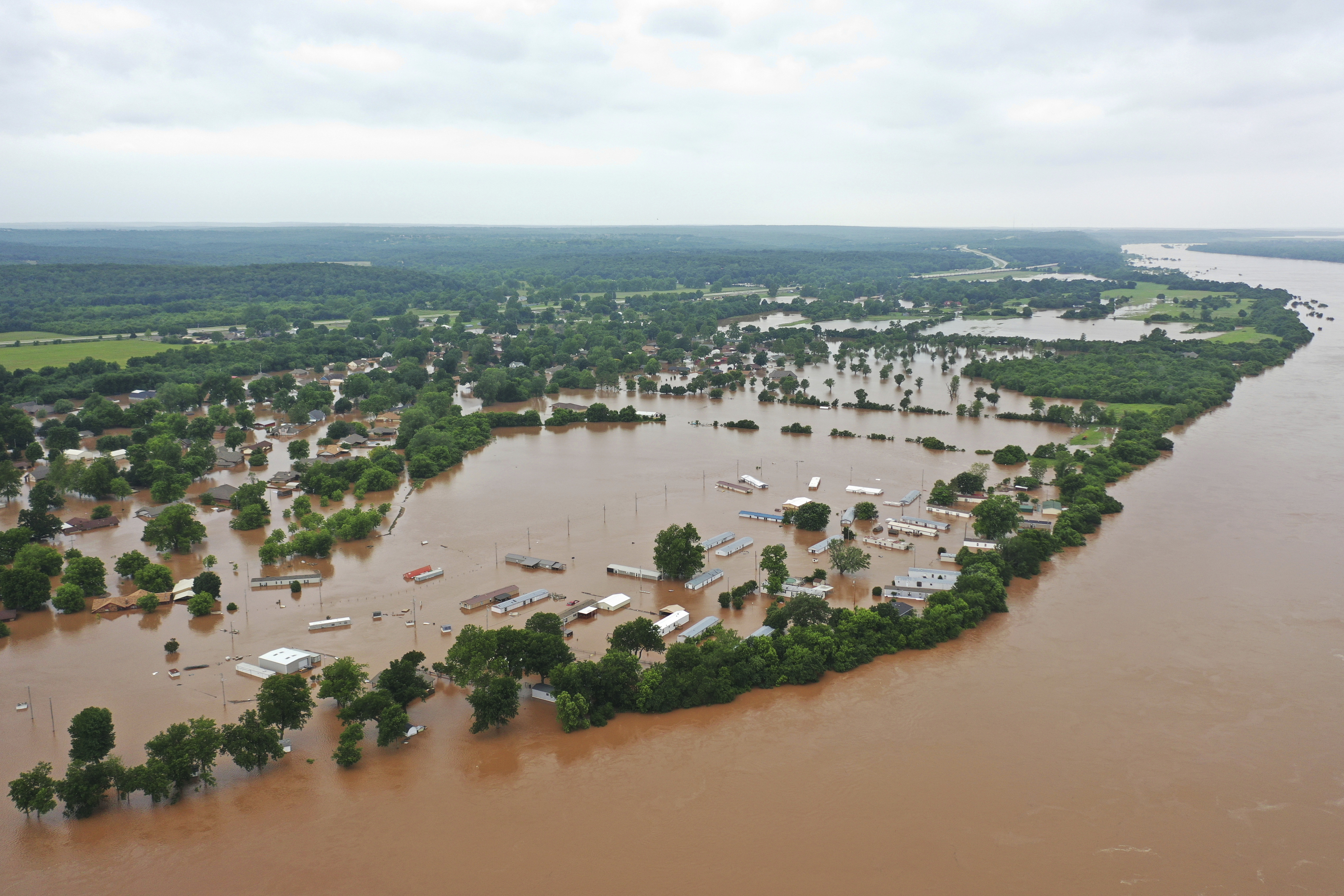 Rain intensifies flooding in saturated Arkansas, Oklahoma