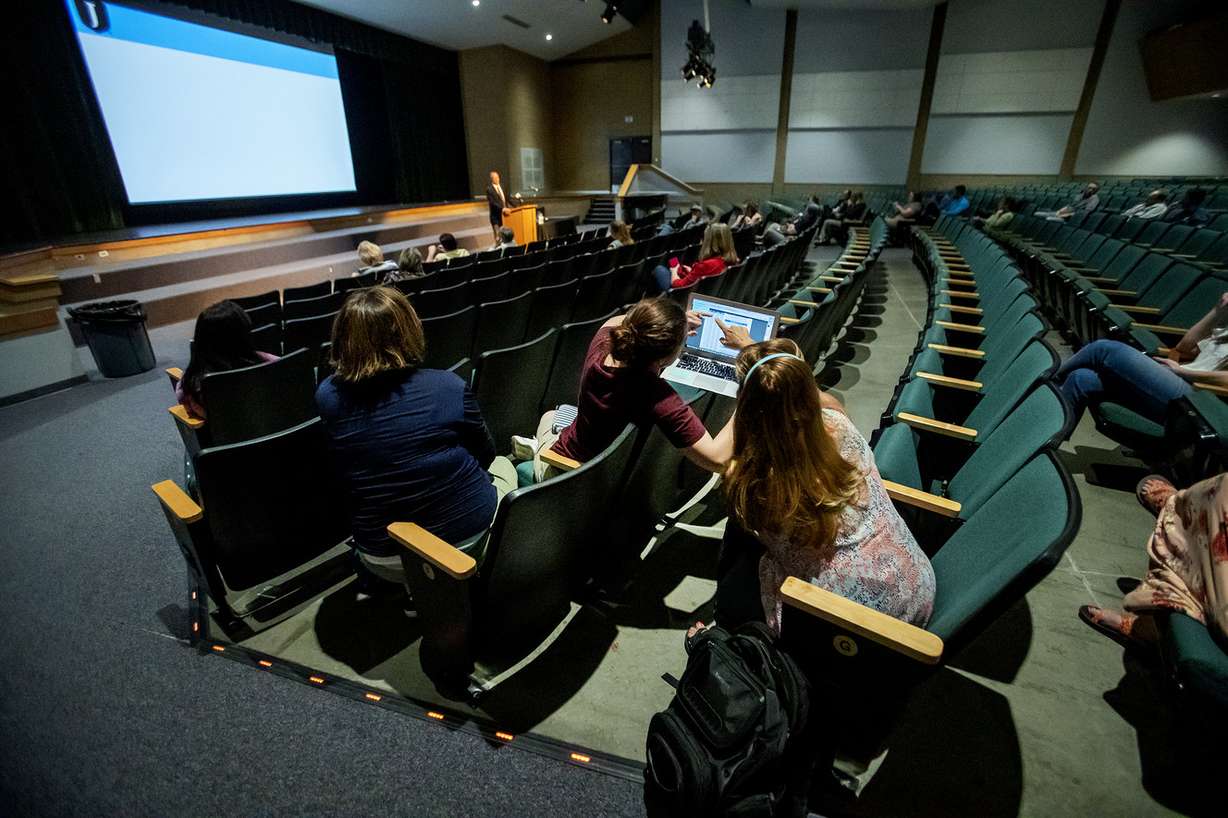 Jordan School Board President Bryce Dunford announces potential teacher raises during a presentation for teachers at Elk Ridge Middle School in South Jordan on Wednesday, May 29, 2019. (Photo: Scott G Winterton, KSL)