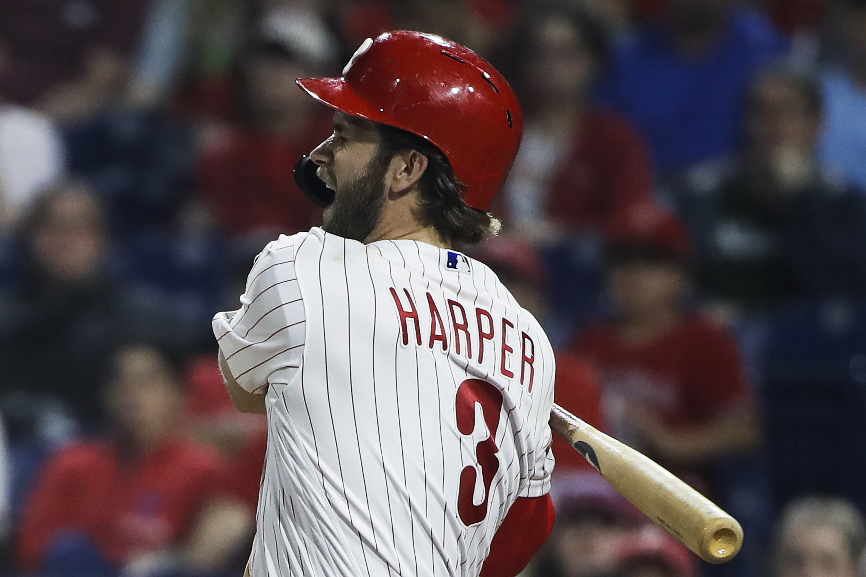 Phillies star Harper leaves game after foul ball off foot