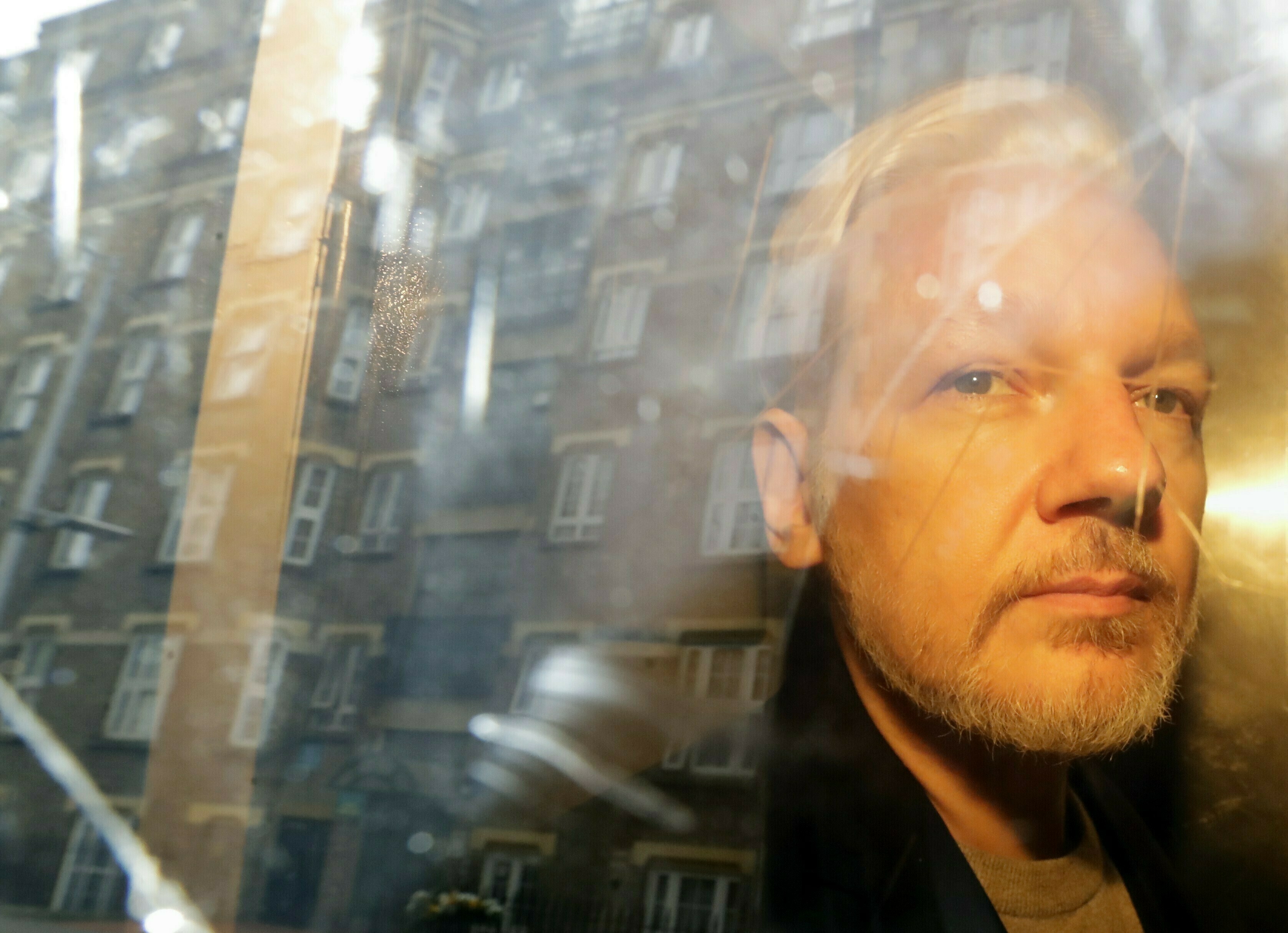 WikiLeaks says Assange is ill; he misses brief court hearing