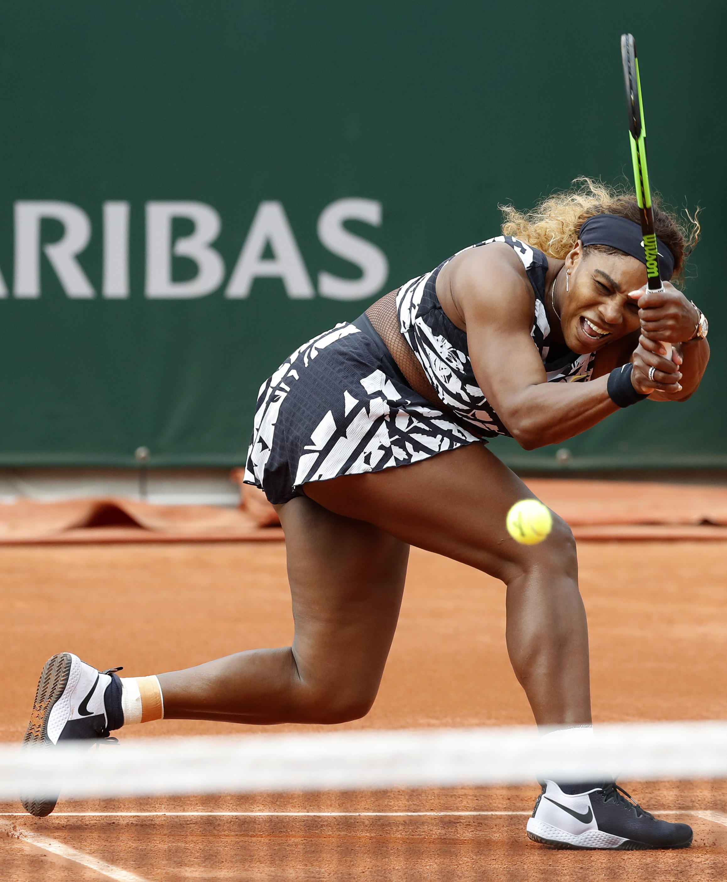 The Latest: '18 champ Halep takes long road to win in Paris