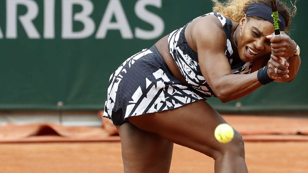 The Latest: '18 champ Halep takes long road to win in Paris