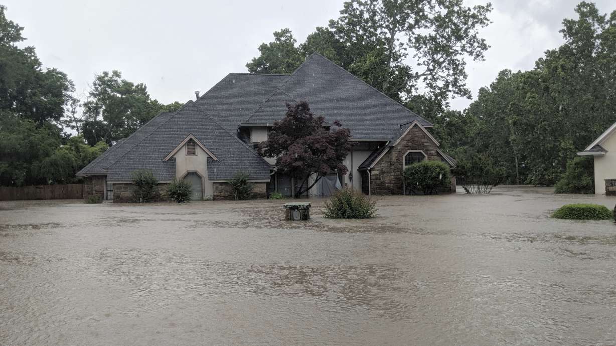 Hundreds in shelters as record flooding hits Arkansas River
