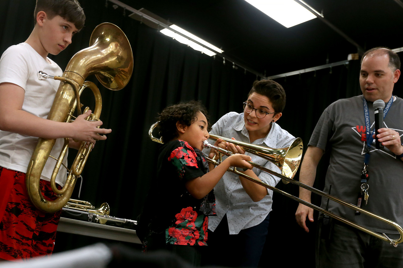 Rock band surprises Salt Lake City school with new instruments