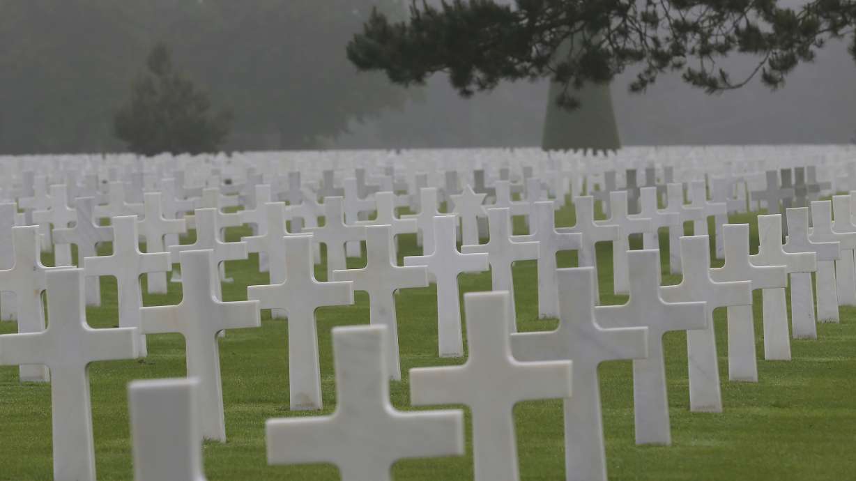 D-Day ceremony spotlights Trump's complicated military ties