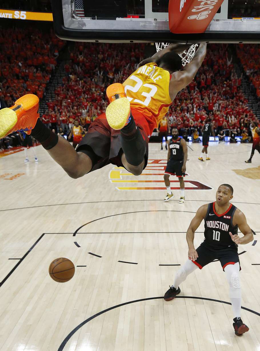 Utah Jazz forward Royce O'Neale (23) dunks on Houston Rockets guard Eric Gordon (10) during NBA playoffs in Salt Lake City on Saturday, April 20, 2019. (Jeffrey D. Allred, KSL)