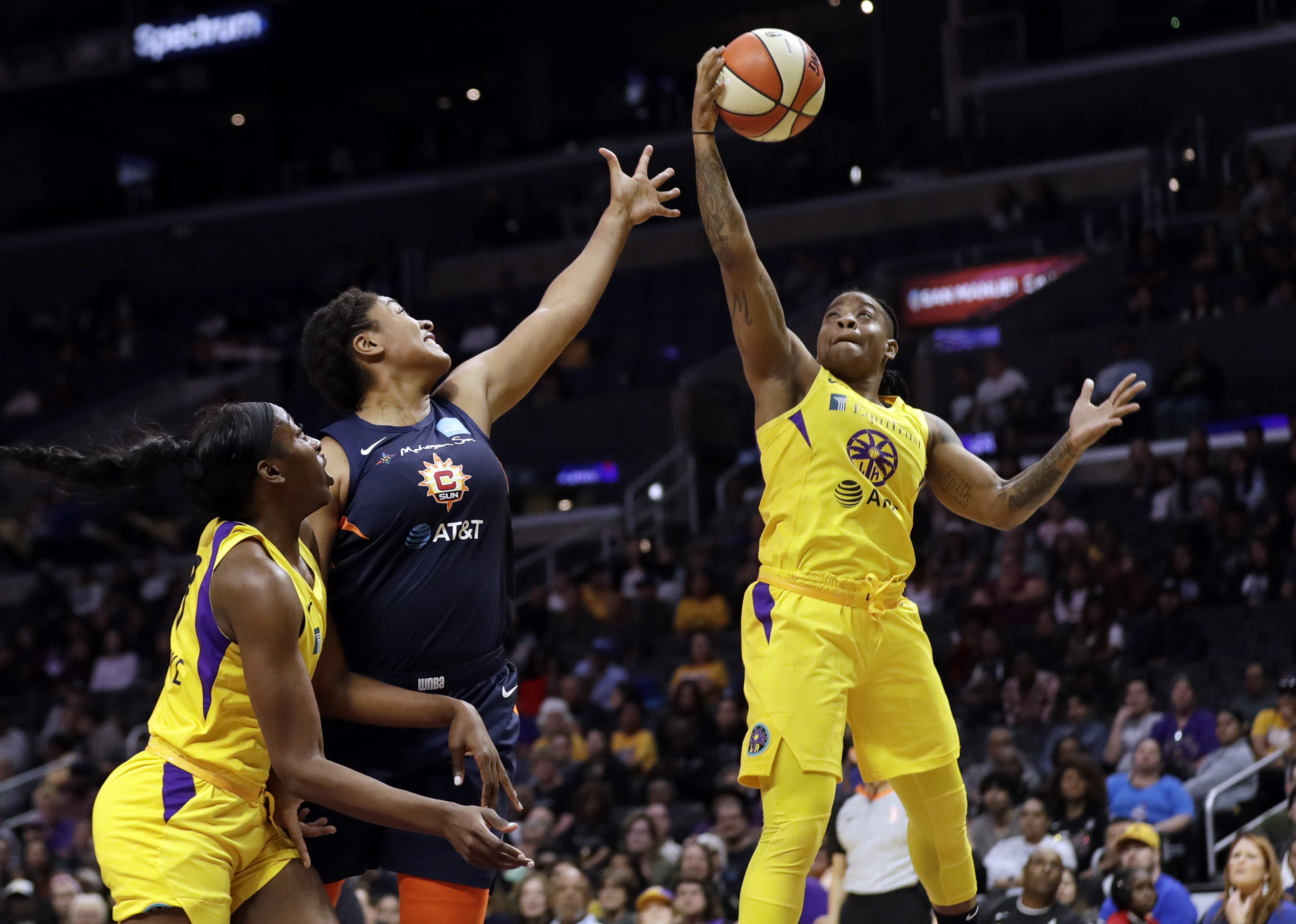 Ogwumike sisters lead Sparks to 77-70 win over Sun