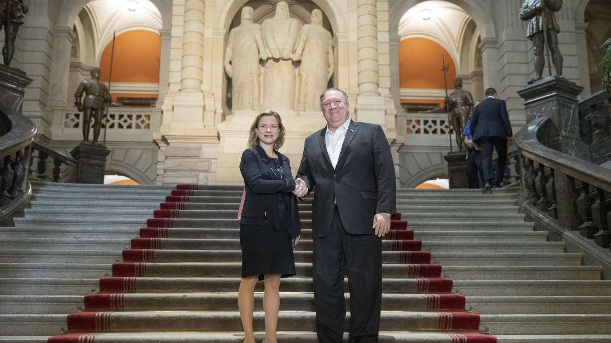 Pompeo visits elite event as Trump policies raise questions