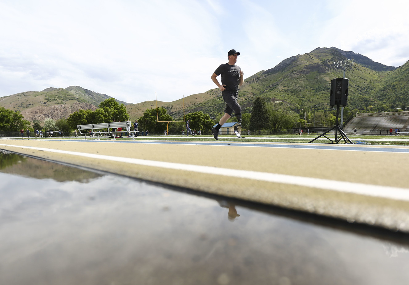 Chris Longacre, 45, runs around the track during the fourth annual Utah Adaptive Mobility Clinic for people with lower extremity limb loss or limb difference at Skyline High School in Salt Lake City on Saturday, June 1, 2019. The event has doubled in size since last year and is put on by Hanger Clinic. (Photo: Silas Walker, KSL)