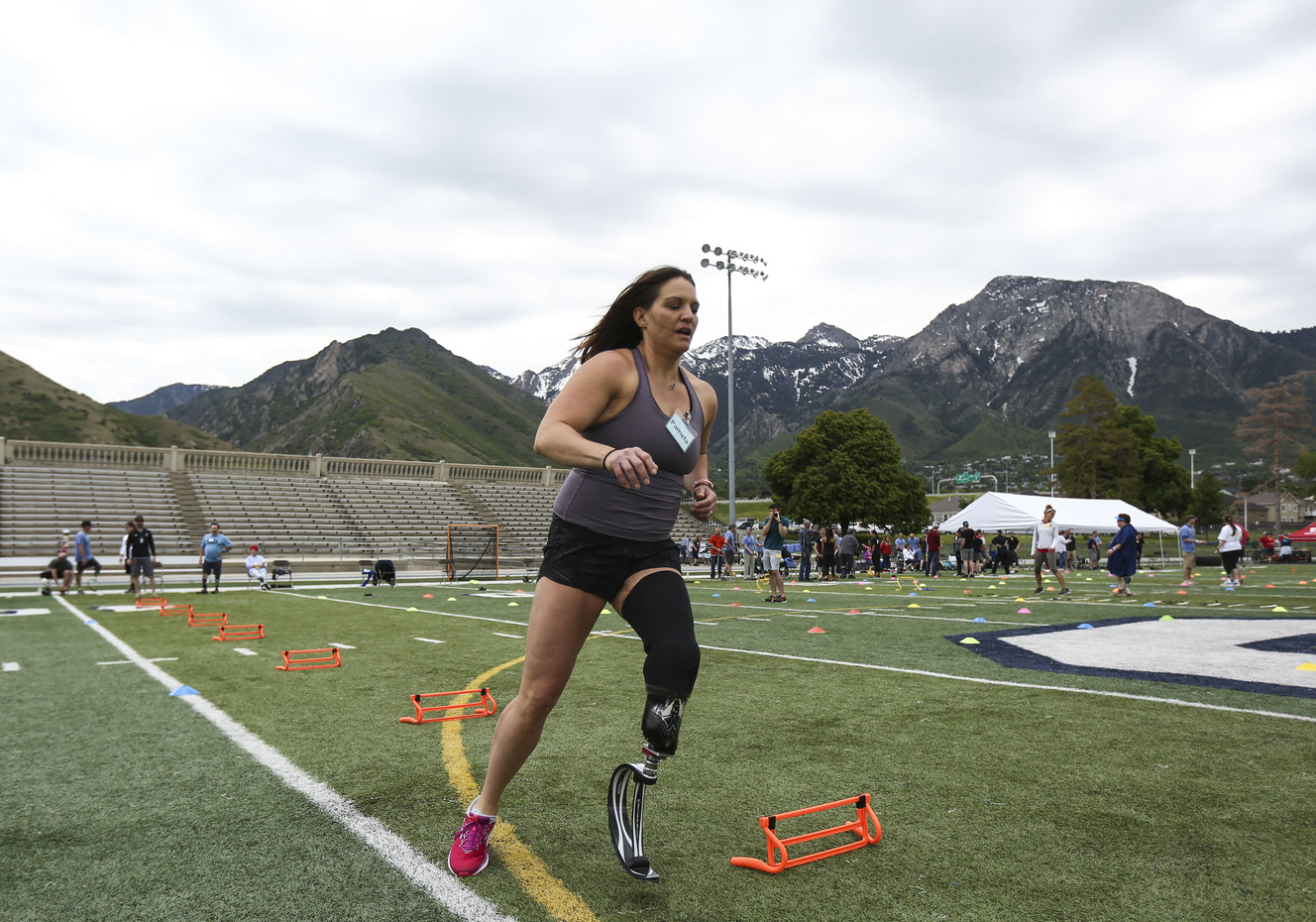 Pamela Hennessy, 38, runs through an obstacle course during the fourth annual Utah Adaptive Mobility Clinic for people with lower extremity limb loss or limb difference at Skyline High School in Salt Lake City on Saturday, June 1, 2019. The event has doubled in size since last year and is put on by Hanger Clinic. (Photo: Silas Walker, KSL)