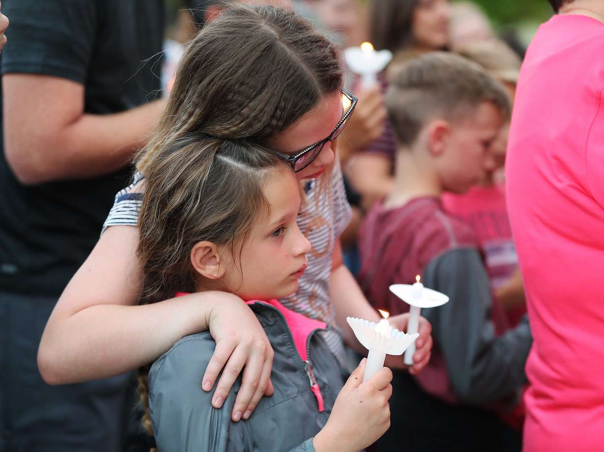 Addison and Sophie Cherrington hug during a candlelight vigil for 5-year-old Elizabeth “Lizzy” Shelley on the steps of the Historic Cache County Courthouse in Logan on Saturday, June 1, 2019. (Photo: Jeffrey D. Allred, KSL)