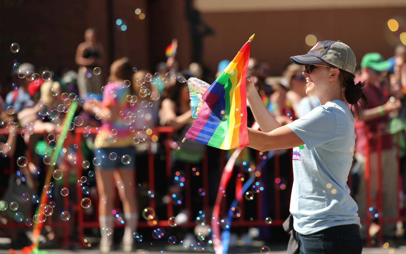 Jenny Castro-Conde blows bubbles during the 44th annual Utah Pride Parade in Salt Lake City on Sunday, June 2, 2019. (Photo: Jeffrey D. Allred, KSL)