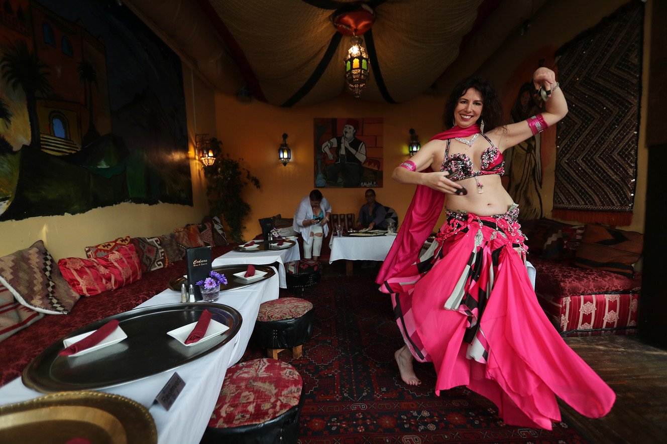 Belly dancer Megan Sybor dances while customers eat at Cedars of Lebanon in Salt Lake City on Friday, May 24, 2019. The restaurant is preparing to close after 38 years in business. (Photo: Scott G Winterton, KSL)