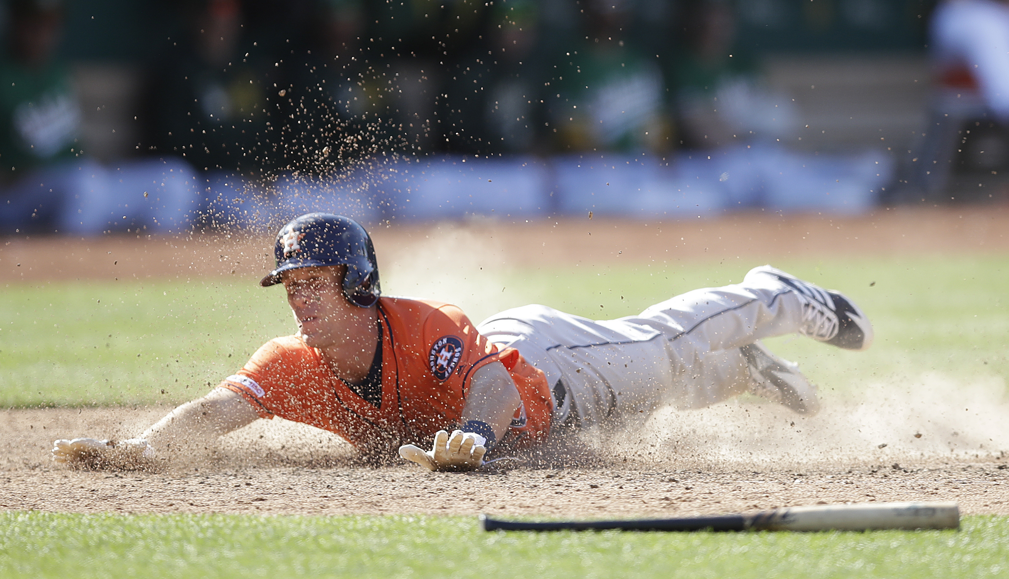 Astros beat Athletics 6-4 in 12 innings for 3-game sweep