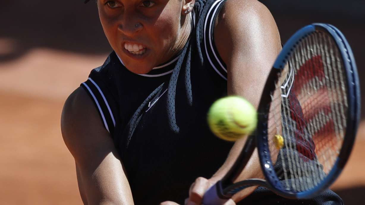 The Latest: Khachanov reaches first Grand Slam quarterfinal