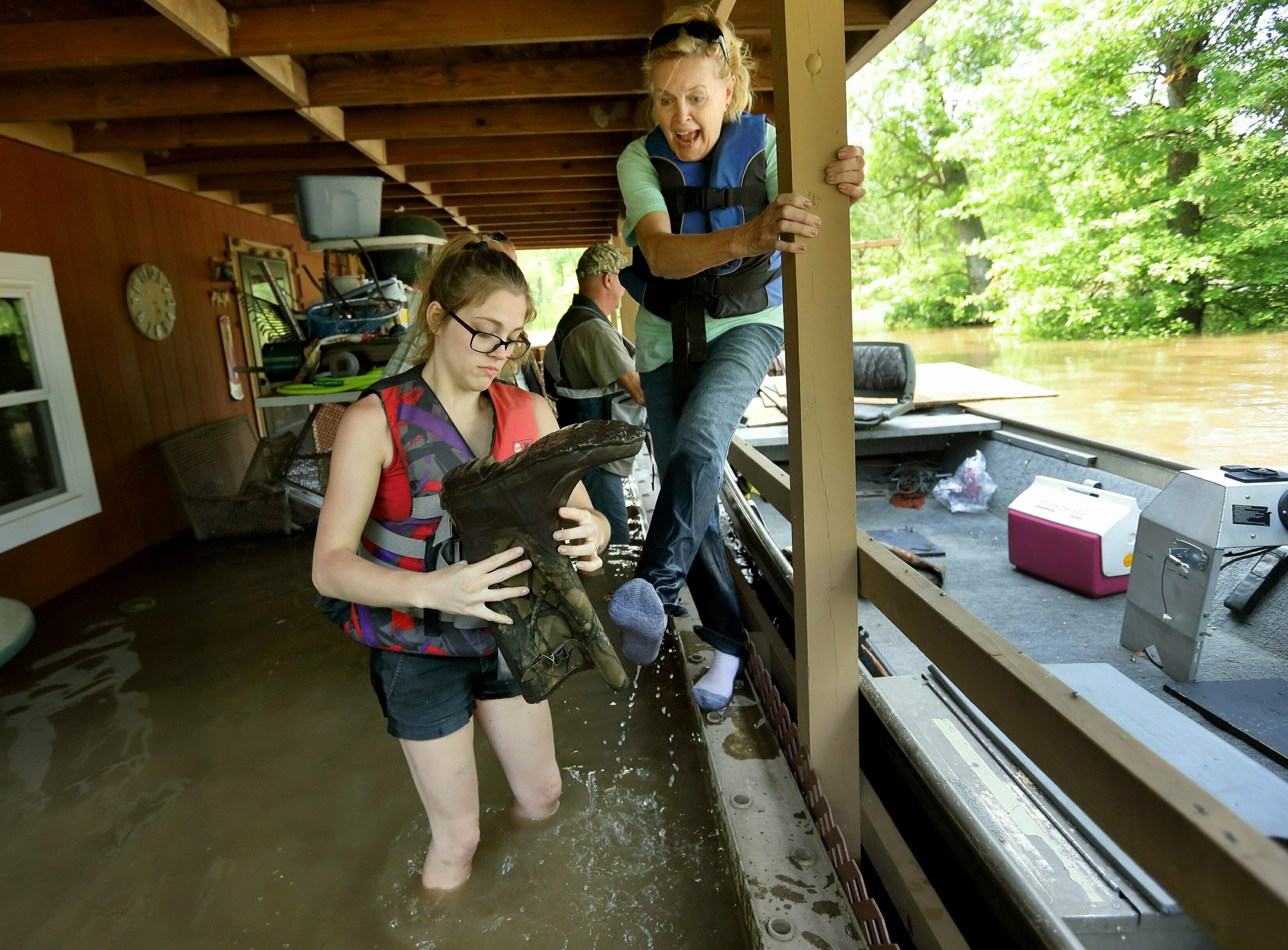 The Latest: Mike Pence to visit flood-damaged Oklahoma