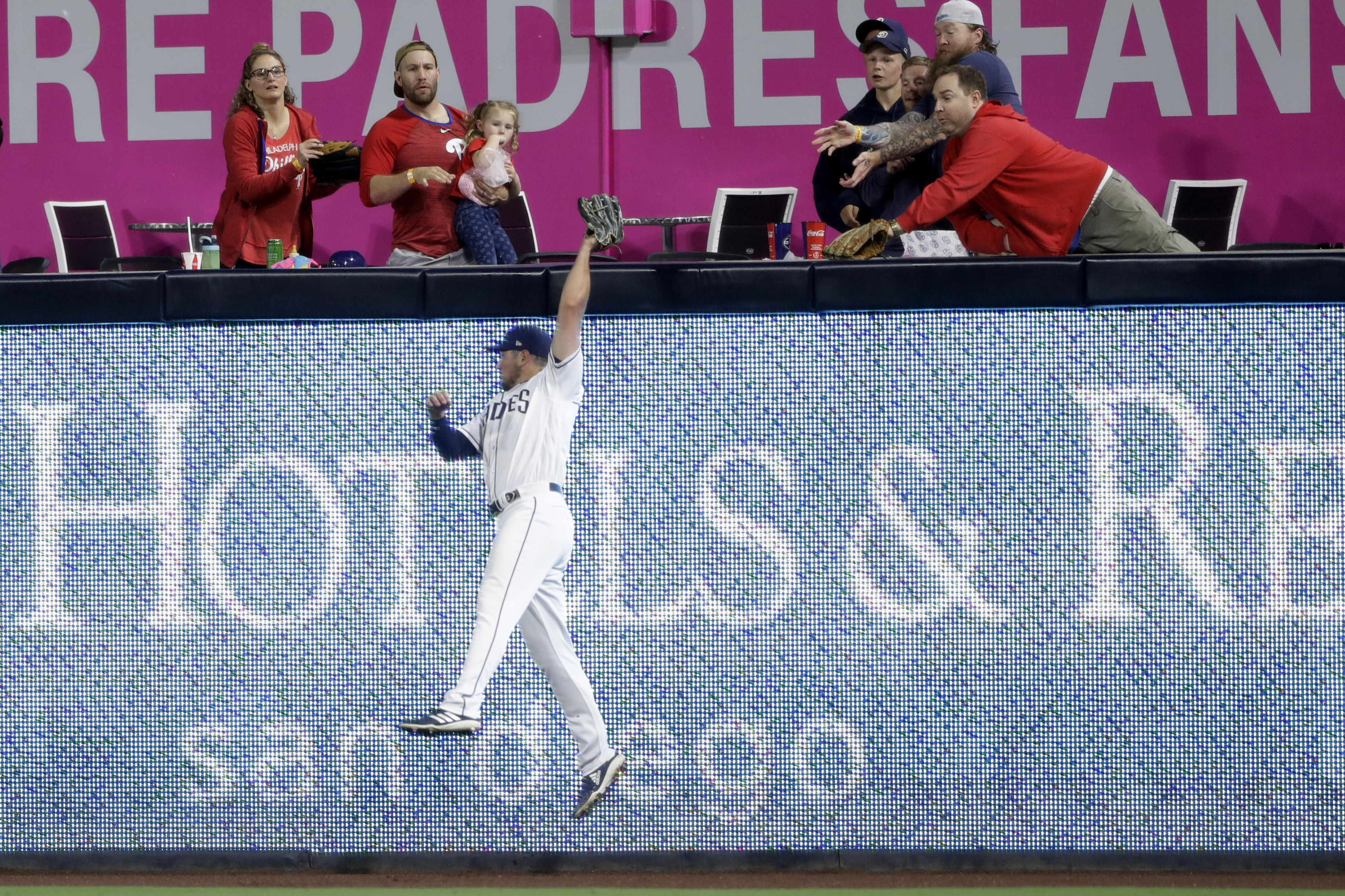 Machado's grand slam carries Padres over Harper's Phillies