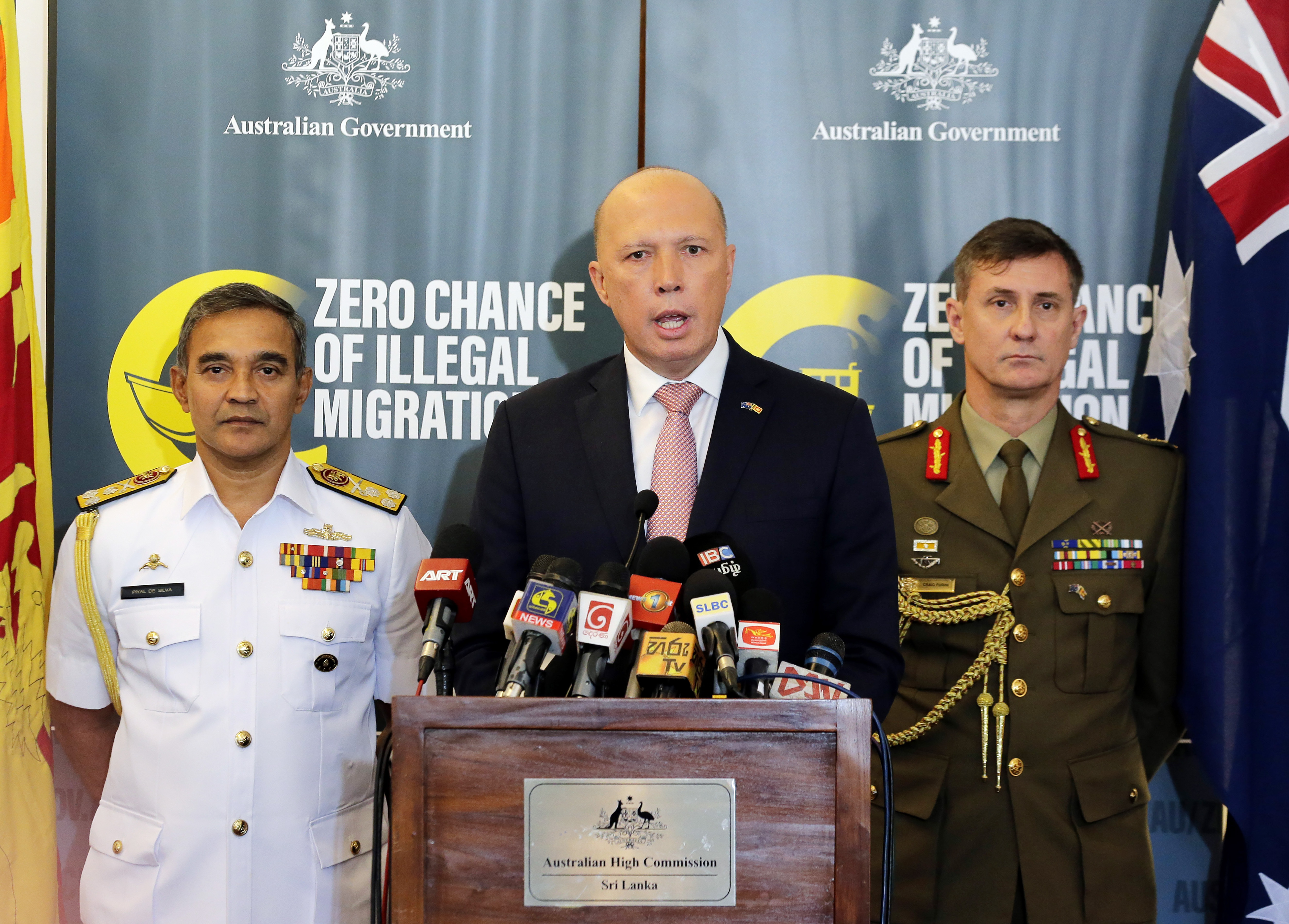 Australia emphasizes tough stance on people smuggling