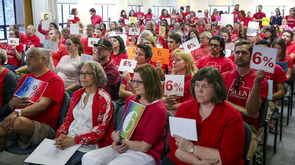 Salt Lake City School District teachers quietly crash meeting to ask for higher salaries
