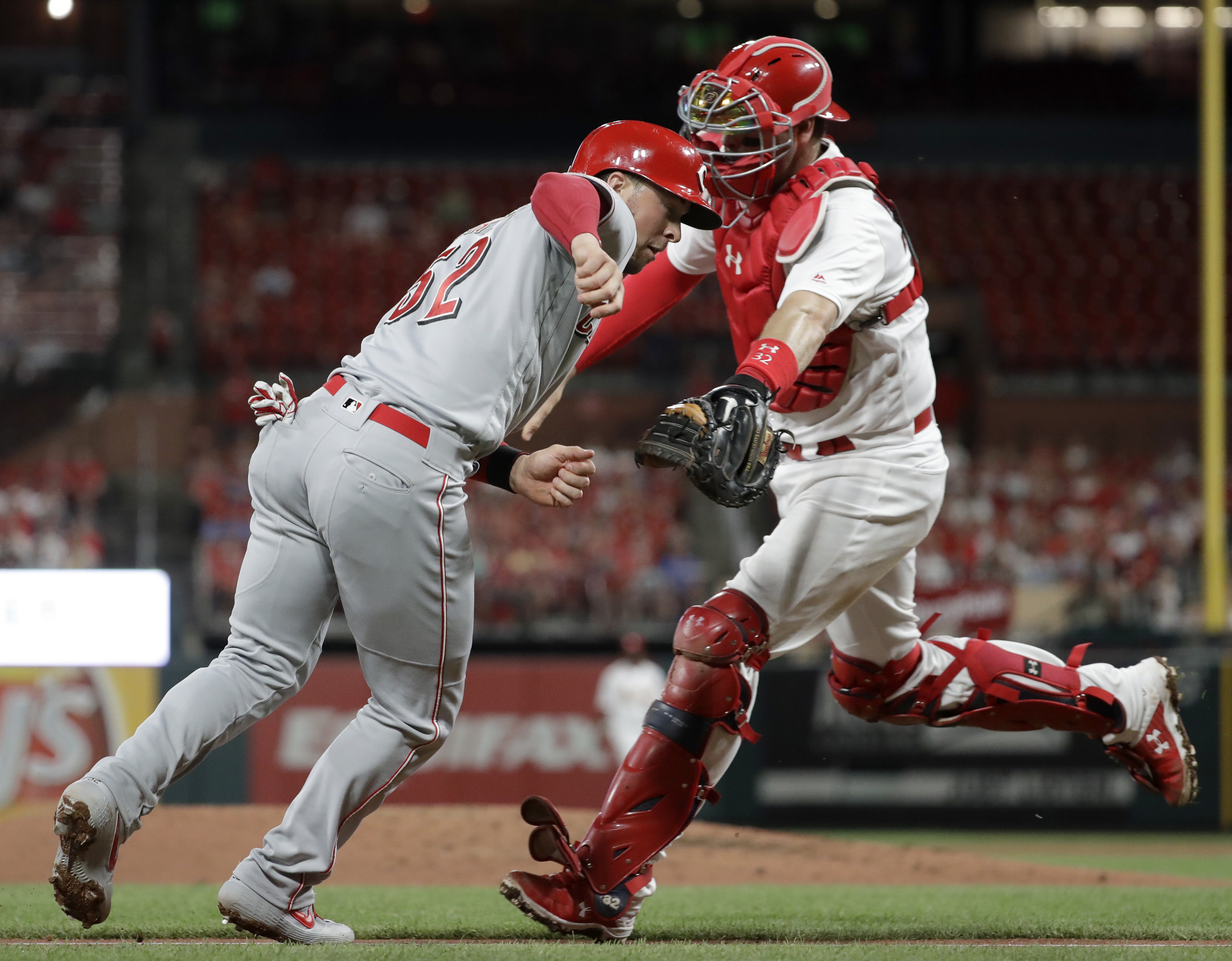 Castillo solid, Puig homers to lead Reds over Cardinals
