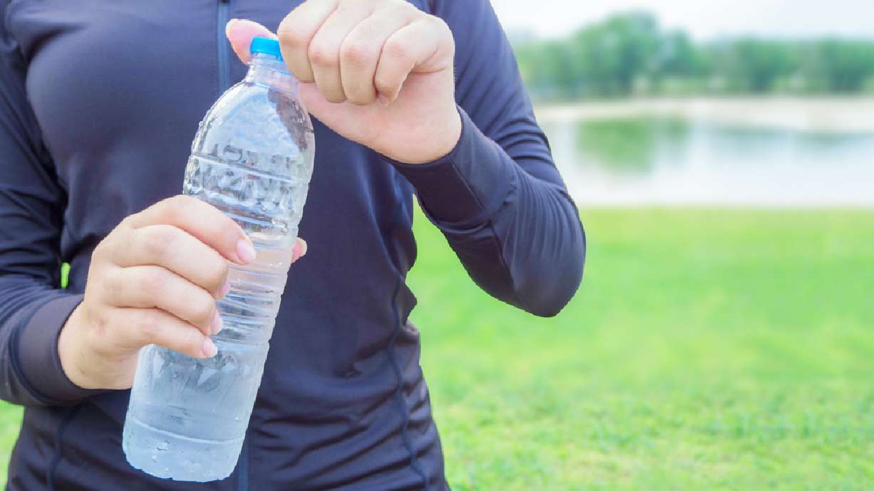 If you drink bottled water, you could double how many microplastic particles you ingest, study says