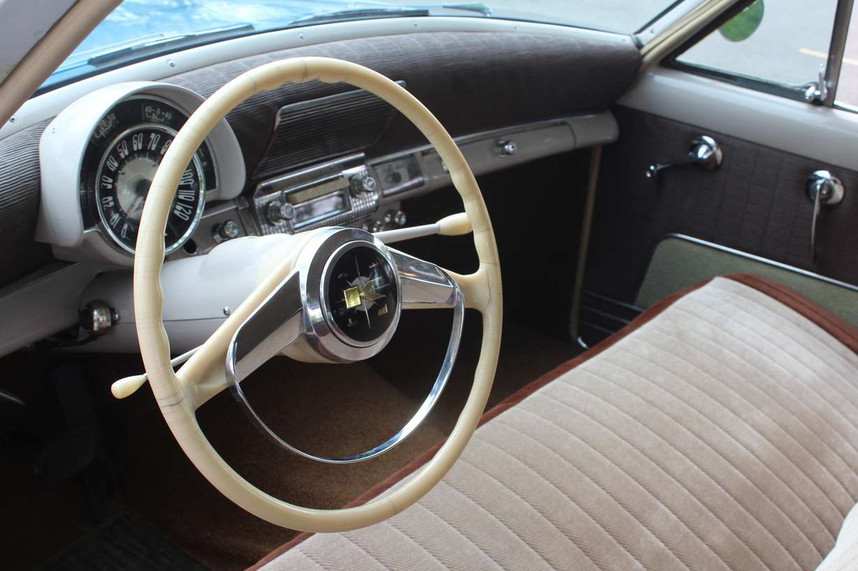 The unique interior in Matt Morrison and Brad Woffinden's 1953 Kaiser Manhattan has an ivory steering wheel. (Photo: Brian Champagne)