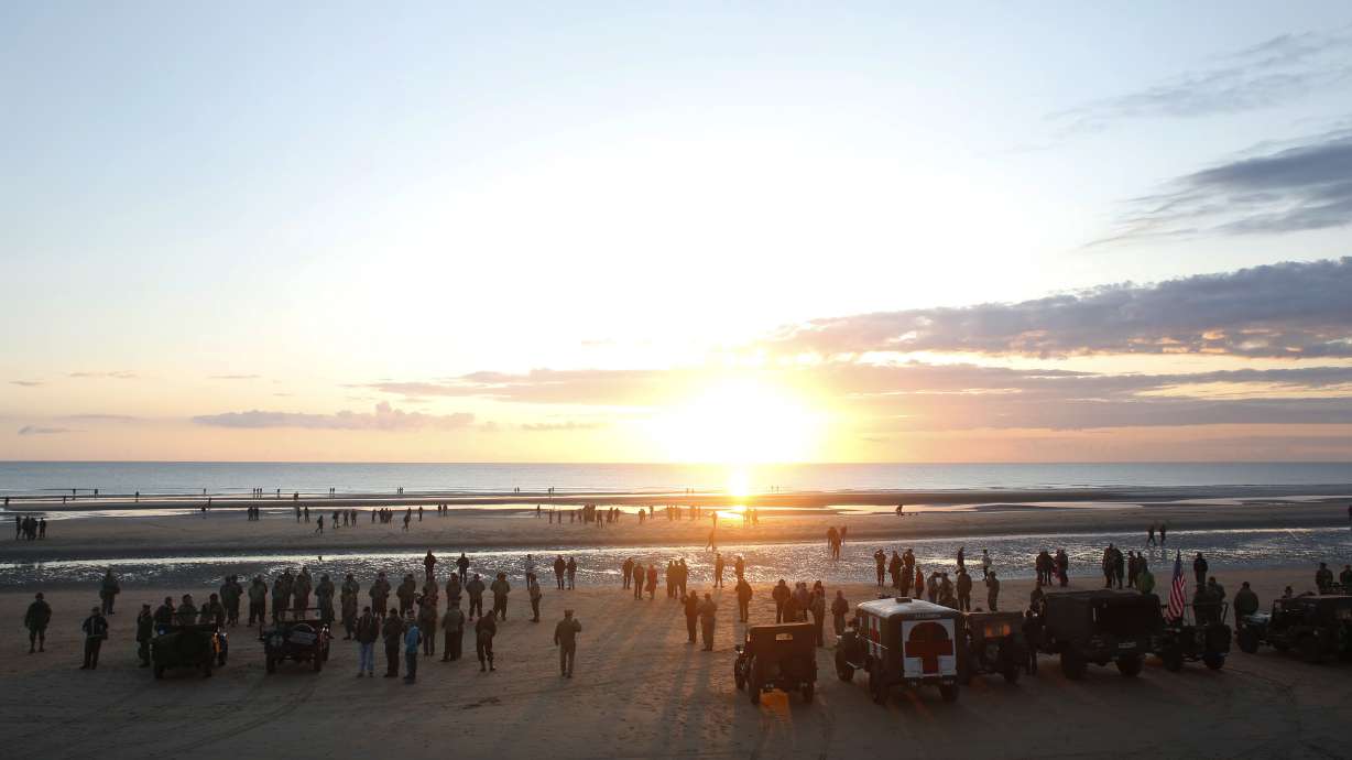 The Latest: French prime minister calls for global peace