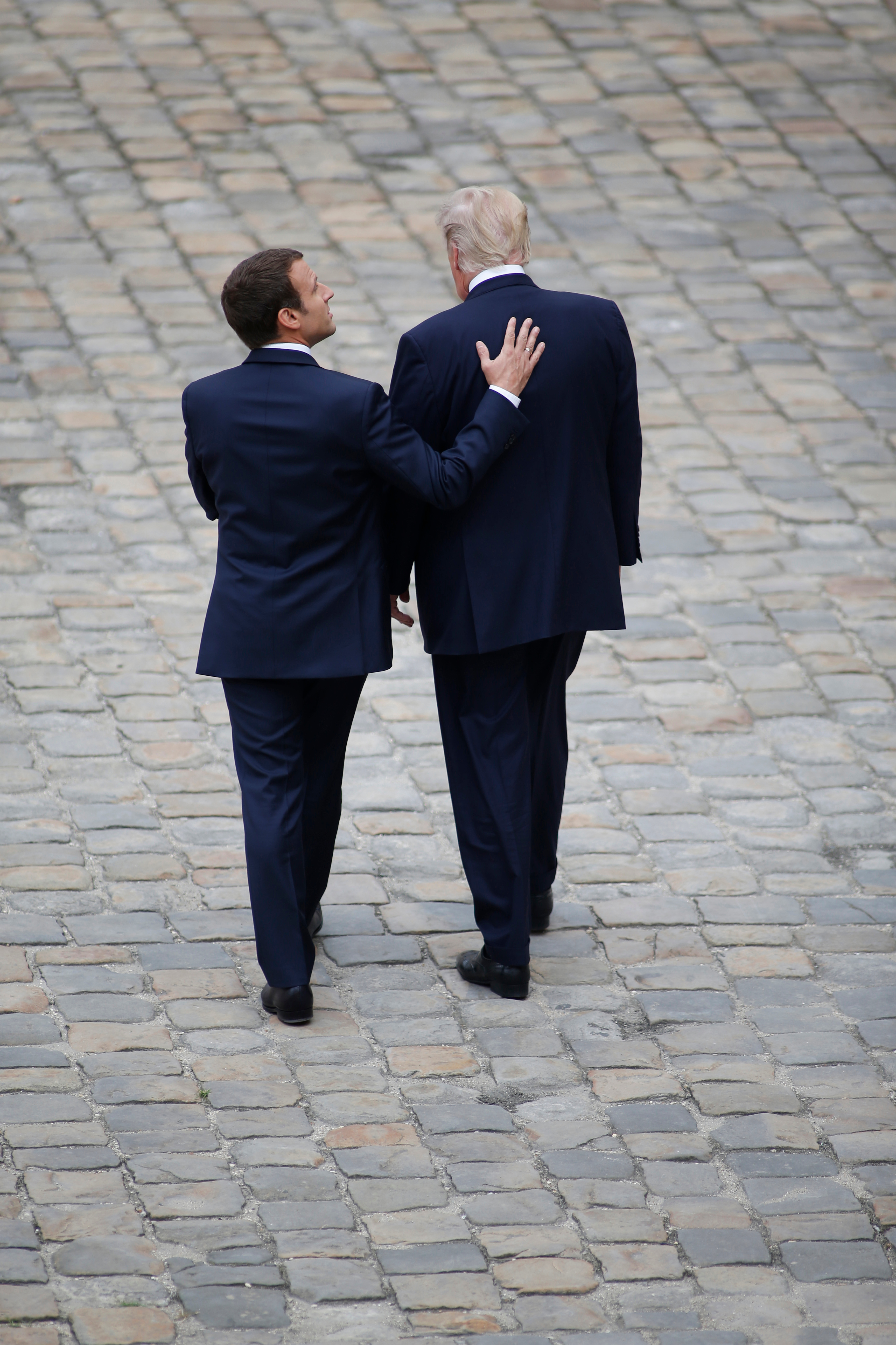 Much to disagree on as Trump, Macron meet on D-Day