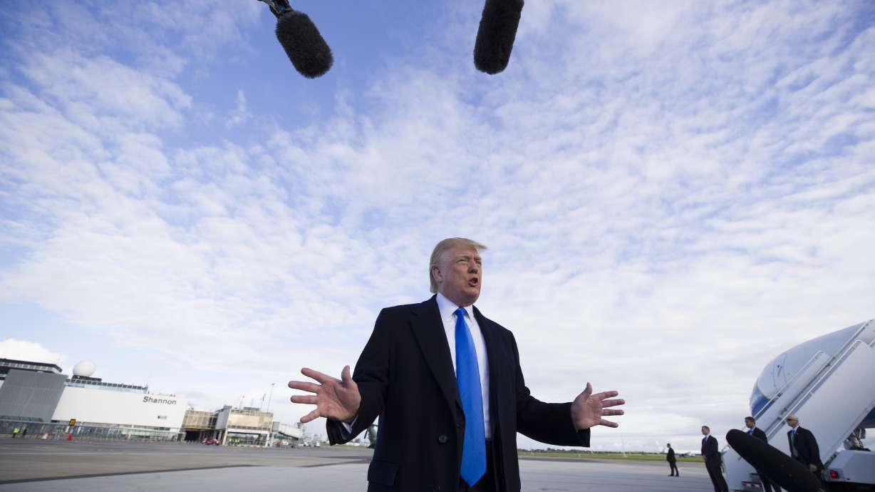 The Latest: Trump hails 'cherished alliance' at D-Day event