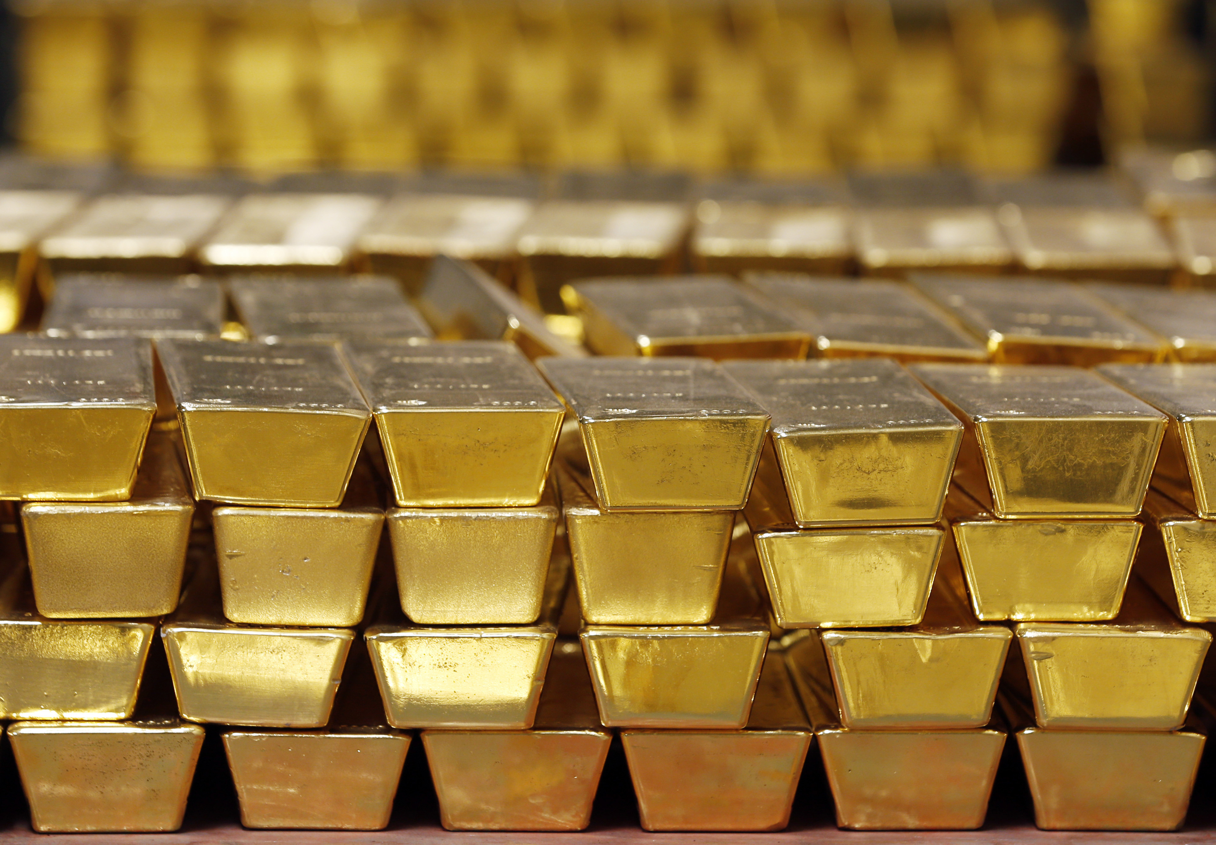 After a delay, gold shines as trade battles hit stocks