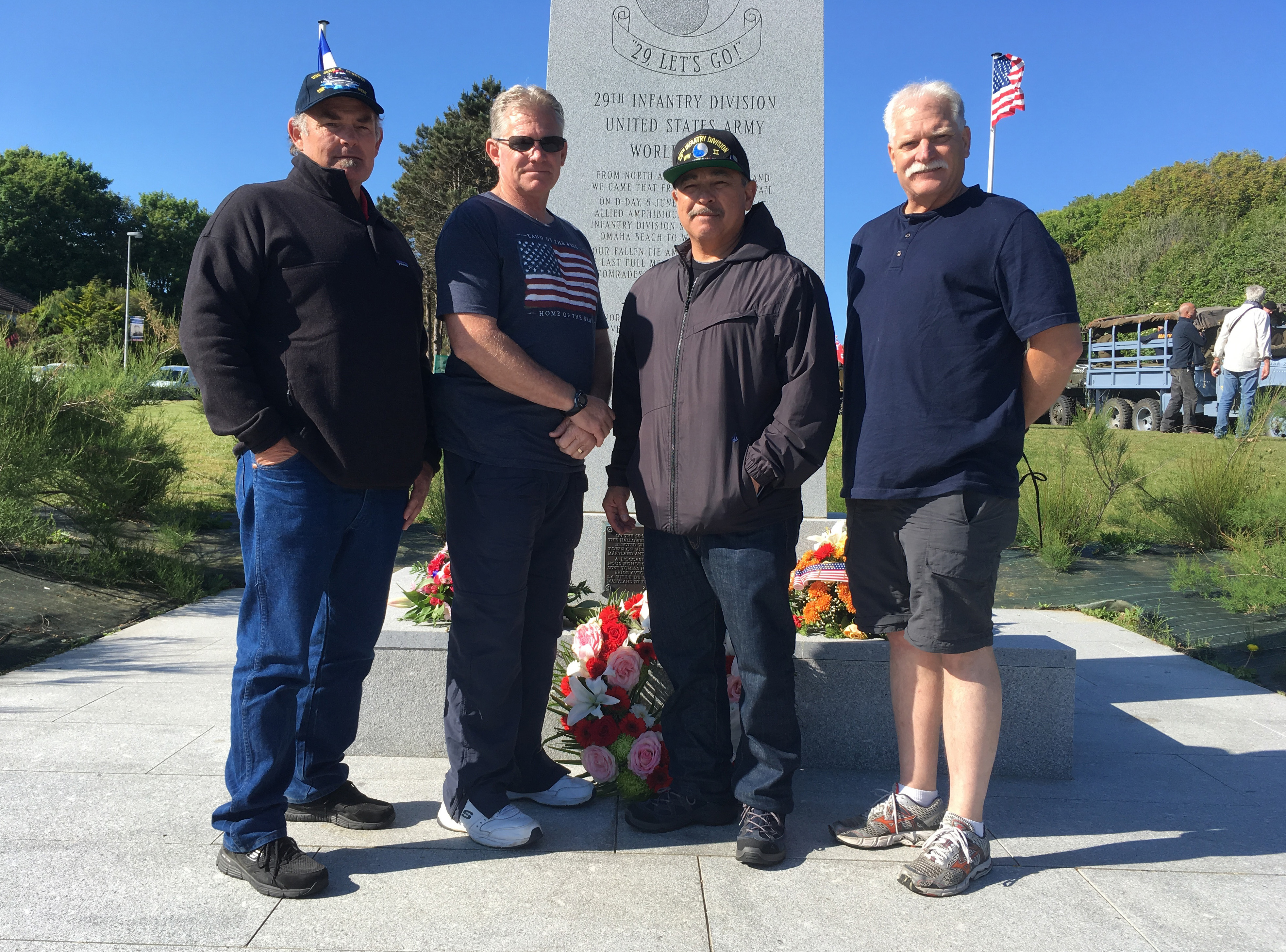 On D-Day beach, 75 years on, awed son follows in dad's steps