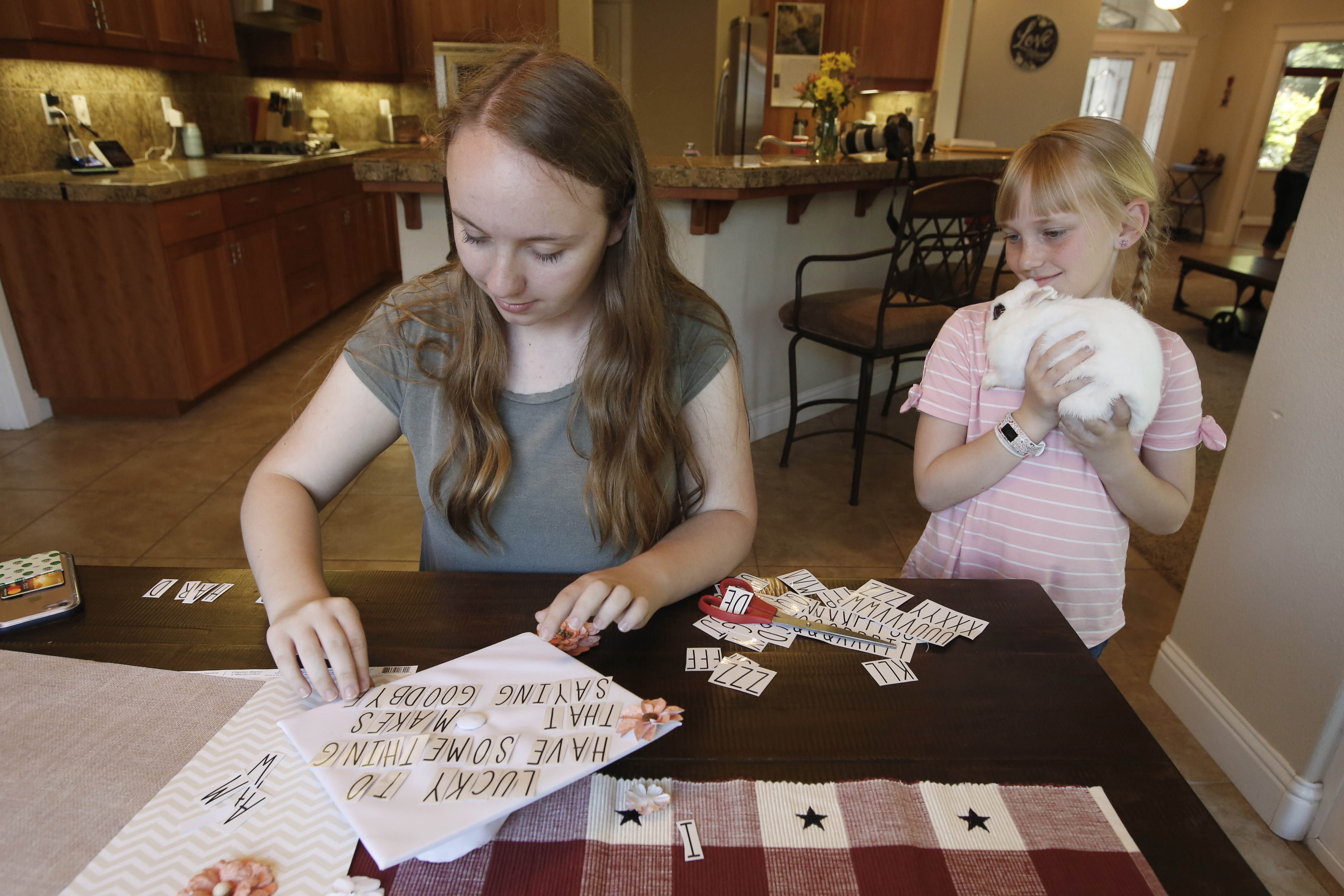 'End where we began': Paradise teens graduate after wildfire