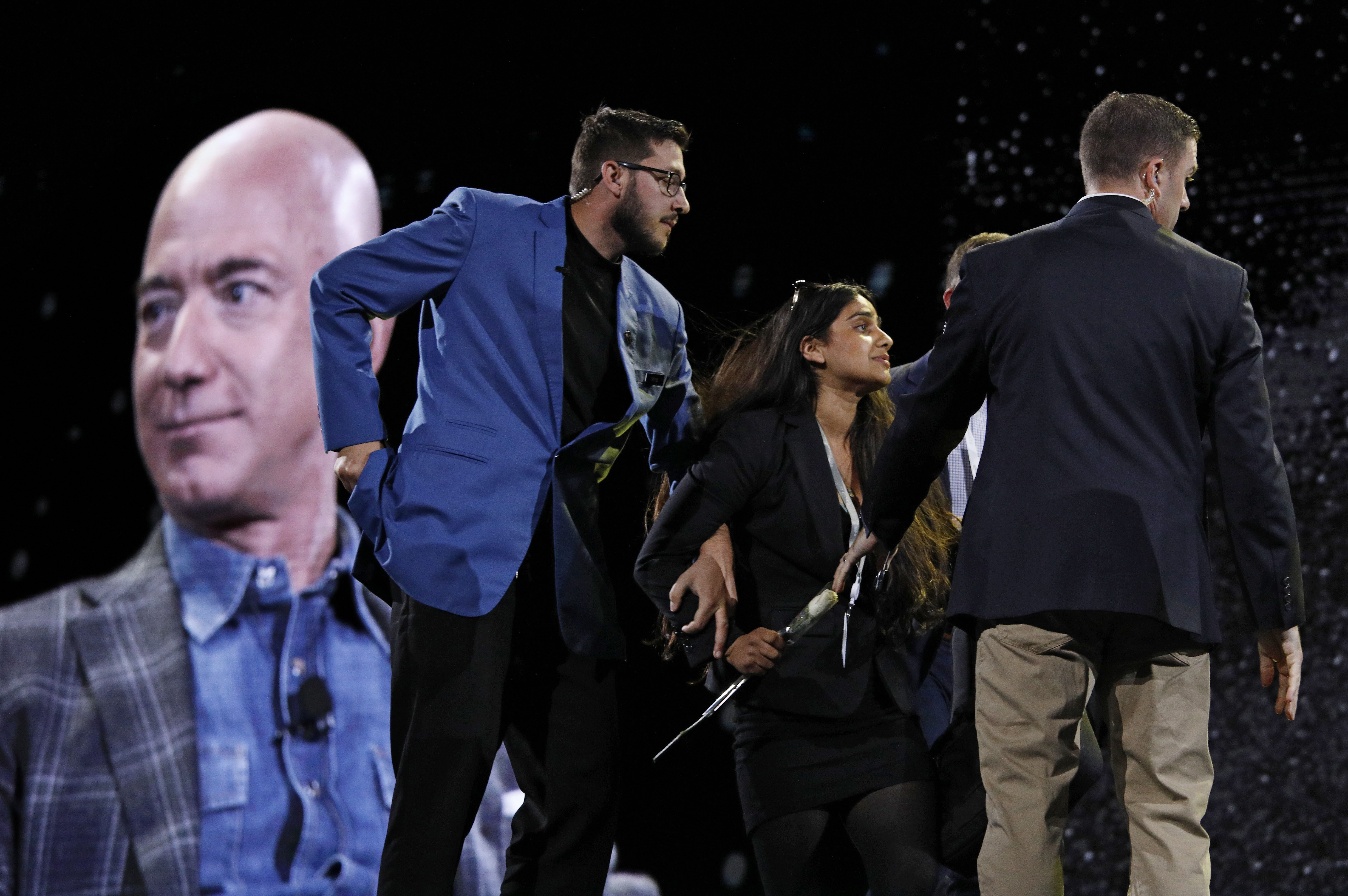 The Latest: Protester arrested at Jeff Bezos Amazon event