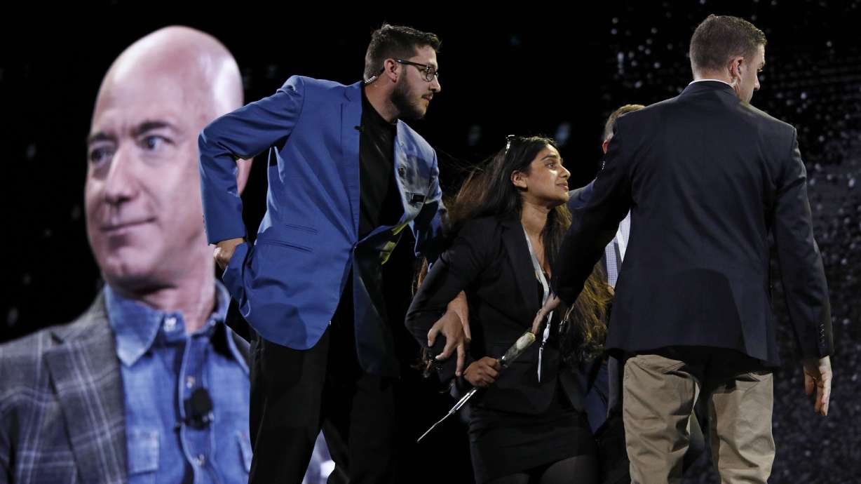 The Latest: Protester arrested at Jeff Bezos Amazon event