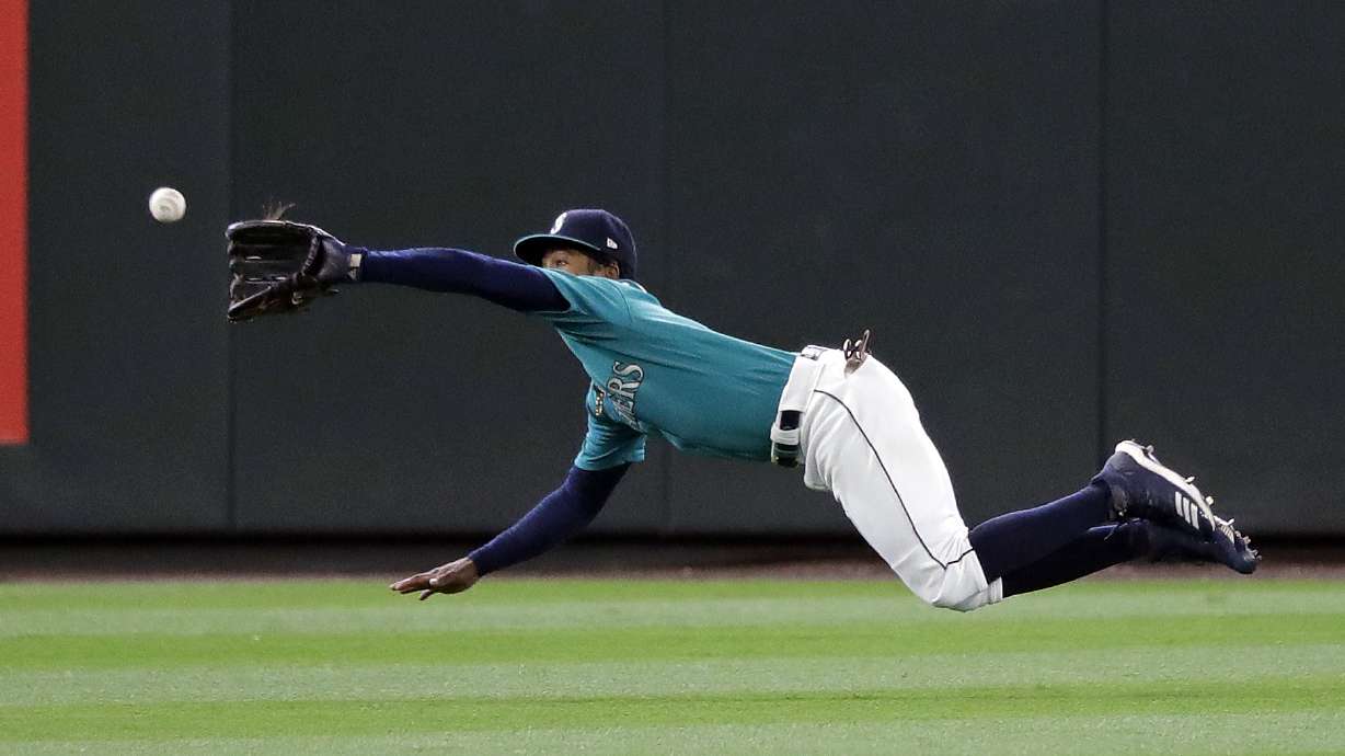 Straw's 3B in 14th lifts Astros over pesky Mariners 8-7