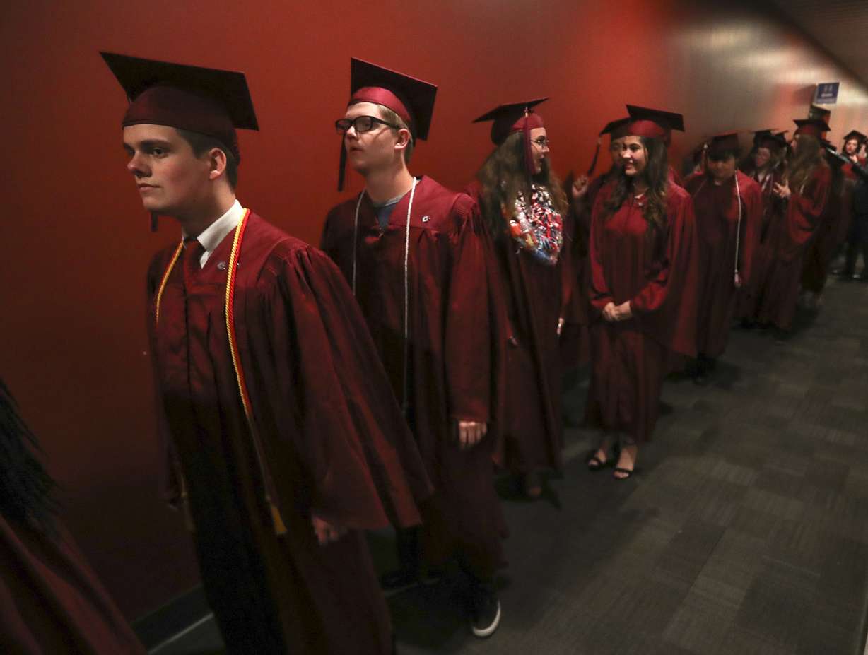 Seniors in the last graduating class of the American International School of Utah wait to receive their diplomas as the school conducts its final day of school and graduation ceremony in Murray on Friday, June 7, 2019. Last month, The public charter school's board of directors voted to shutter the school. (Photo: Steve Griffin, KSL)