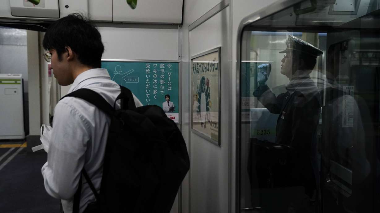 AP Photos: In the loop: Tokyo seen from commuter train line