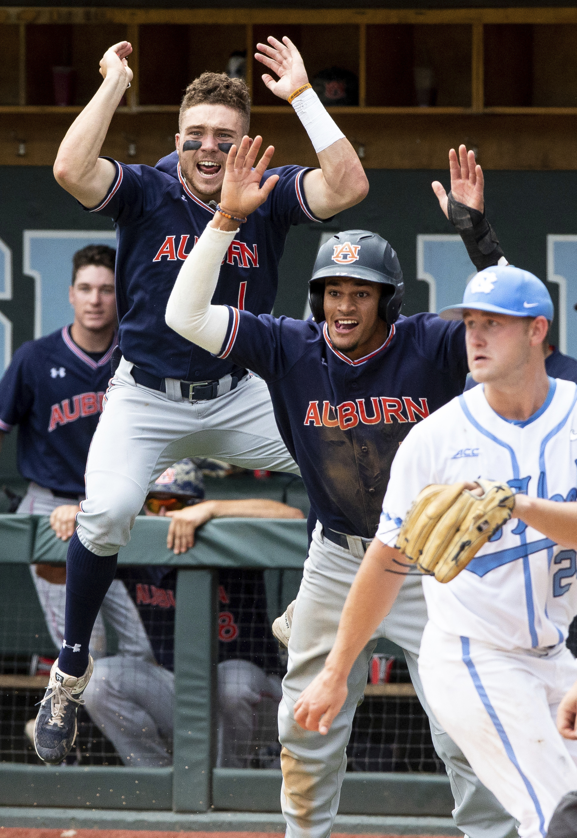 Woley, Julien rally Auburn past North Carolina 11-7