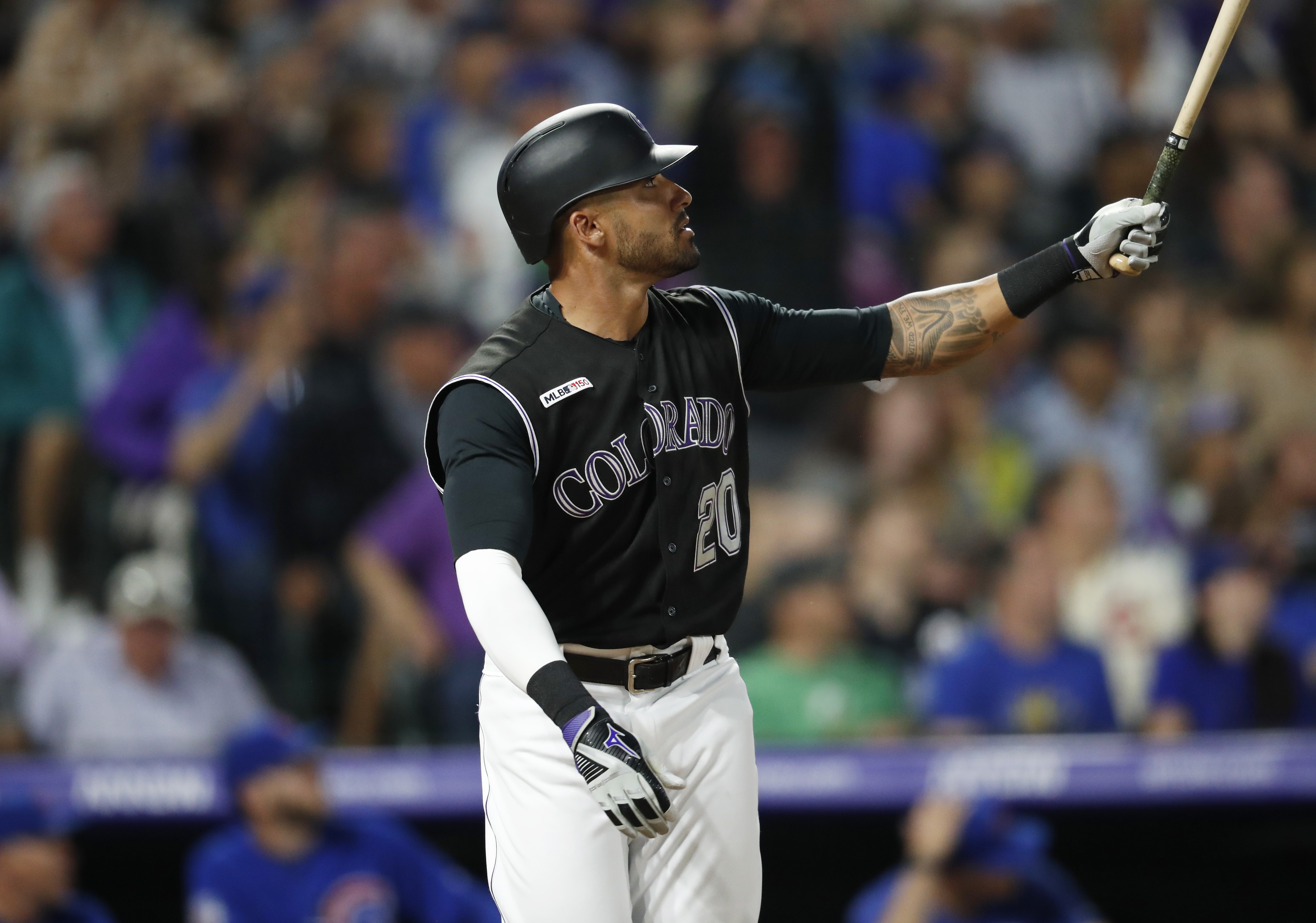 Powerful Rockies rally past Cubs, 9th straight win at home