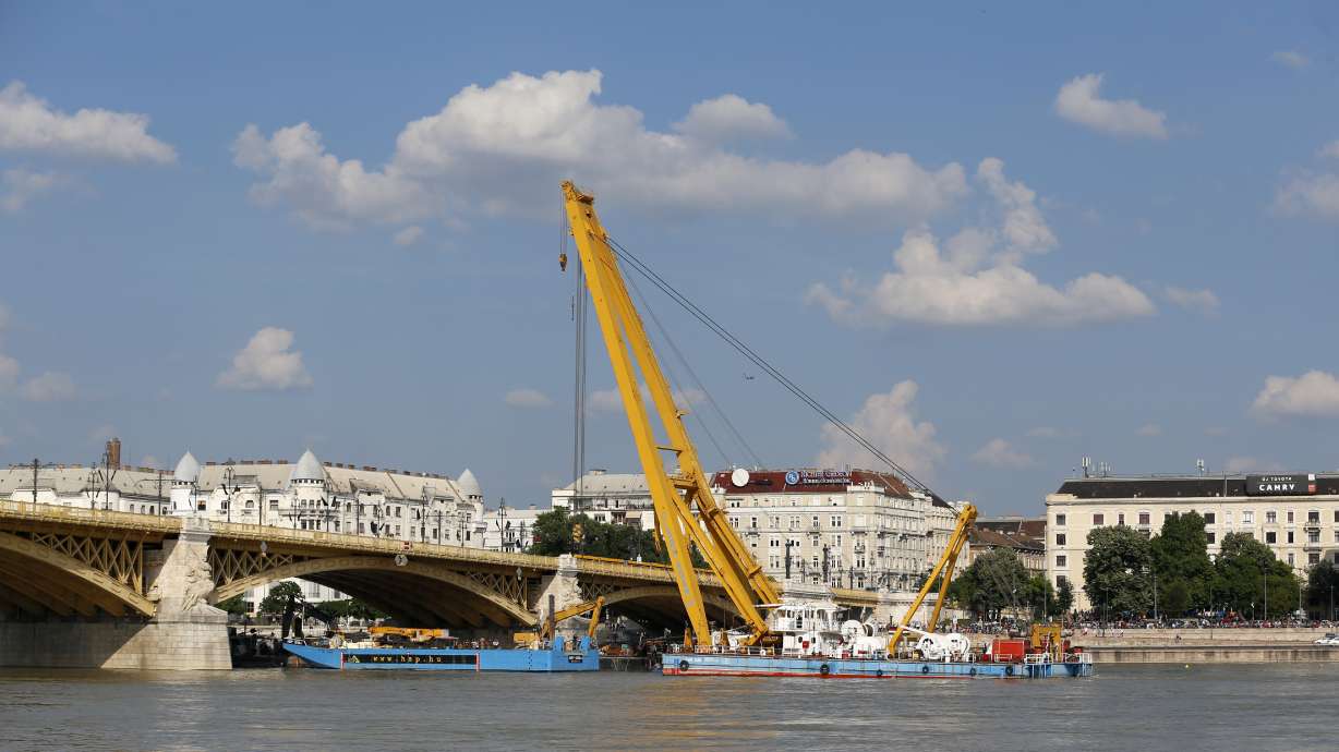 Sunken Danube tour boat is raised in Hungary, 4 bodies found