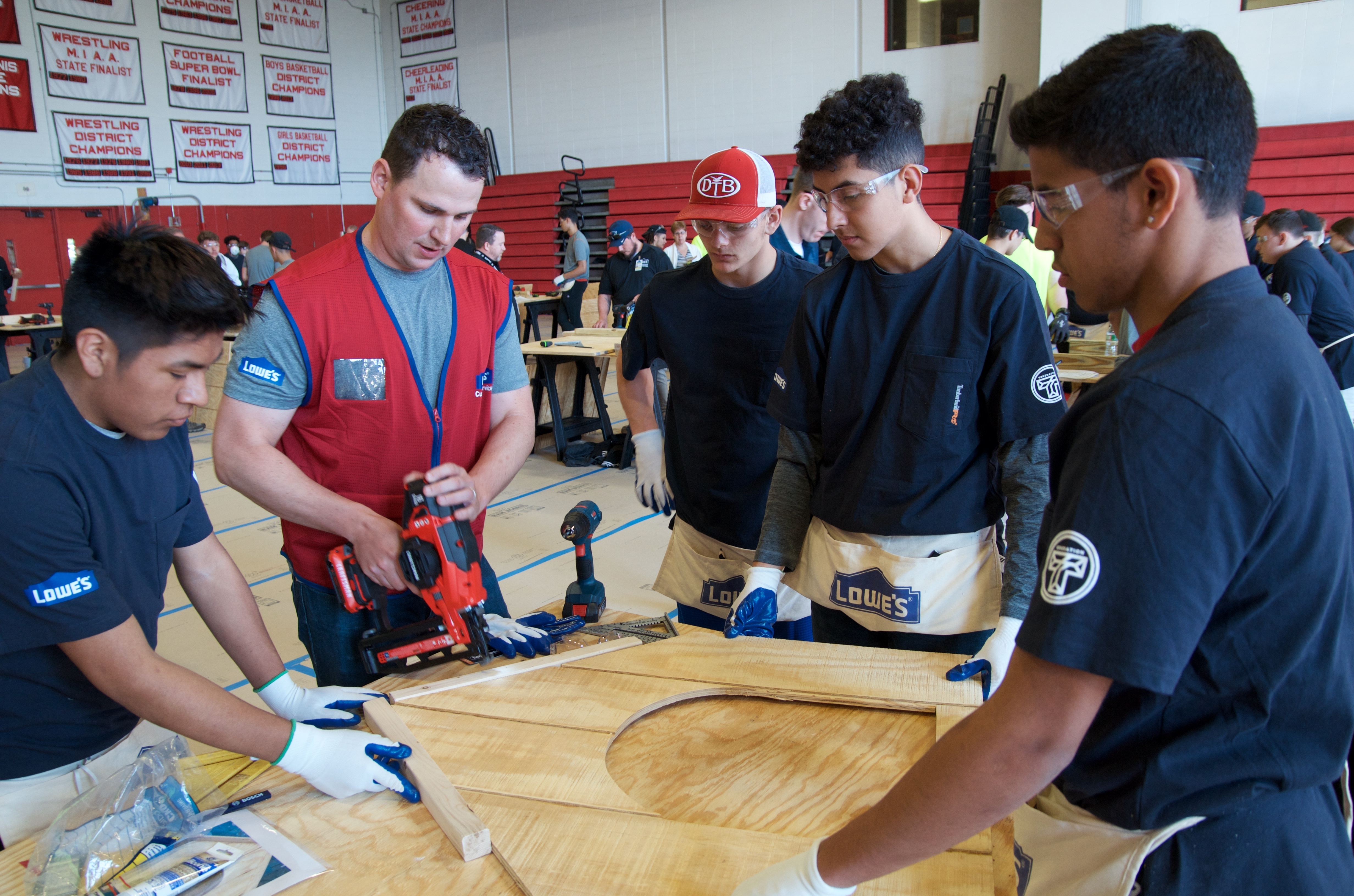 This April 25, 2019 photo provided by Lowe's shows students at Milford High School in Milford, Mass., participating in an immersion event at the launch of the Lowe's Generation T initiative. Photo: Curt Springer/Lowe's via AP