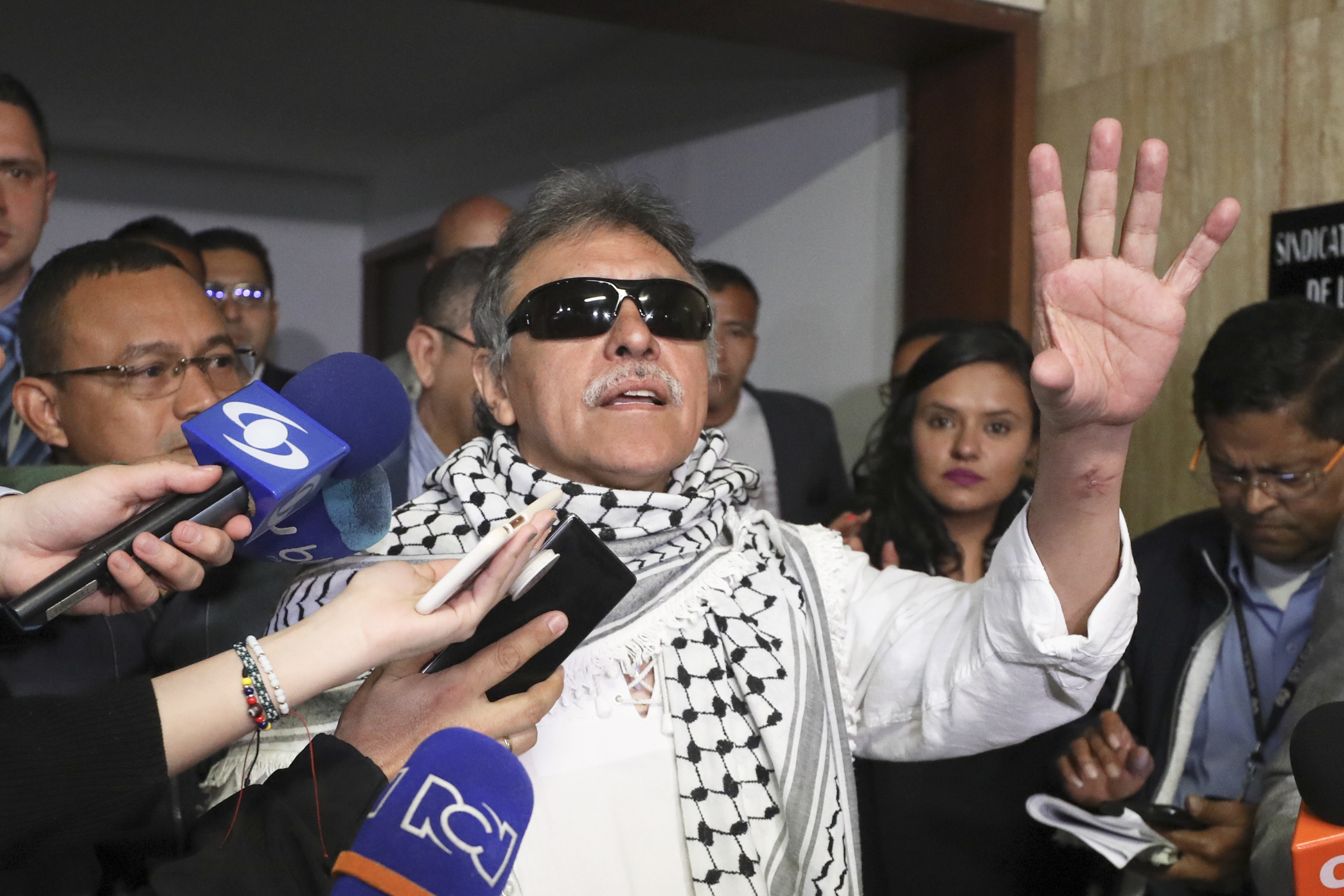 Colombia ex-rebel, wanted in US, sworn in as congressman