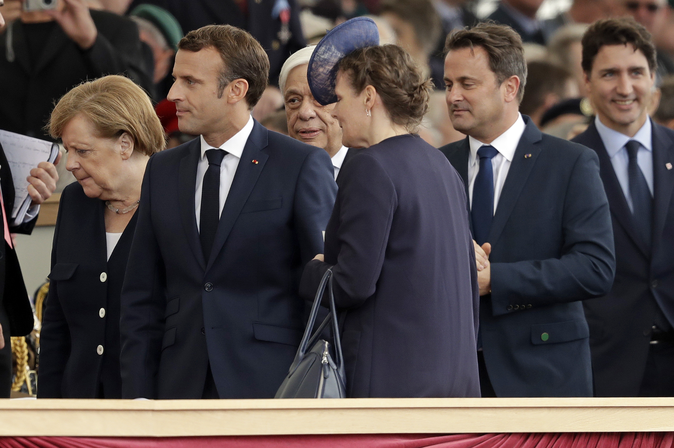 France's Macron backs Merkel for EU post - if she wants it