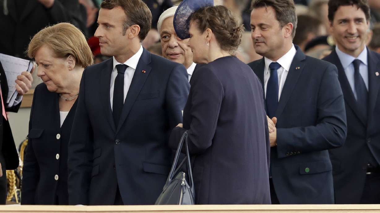 France's Macron backs Merkel for EU post - if she wants it