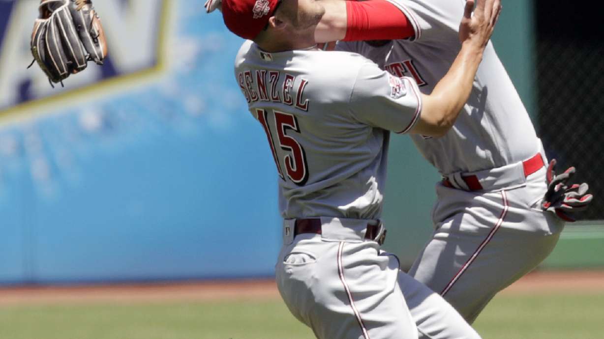 Reds open game with 2 homers, beat Indians 7-2, split series