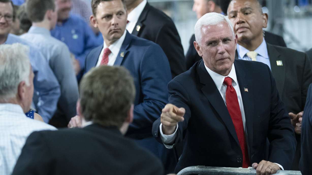 While Trump wages trade war, Pence tries to ease GOP anxiety